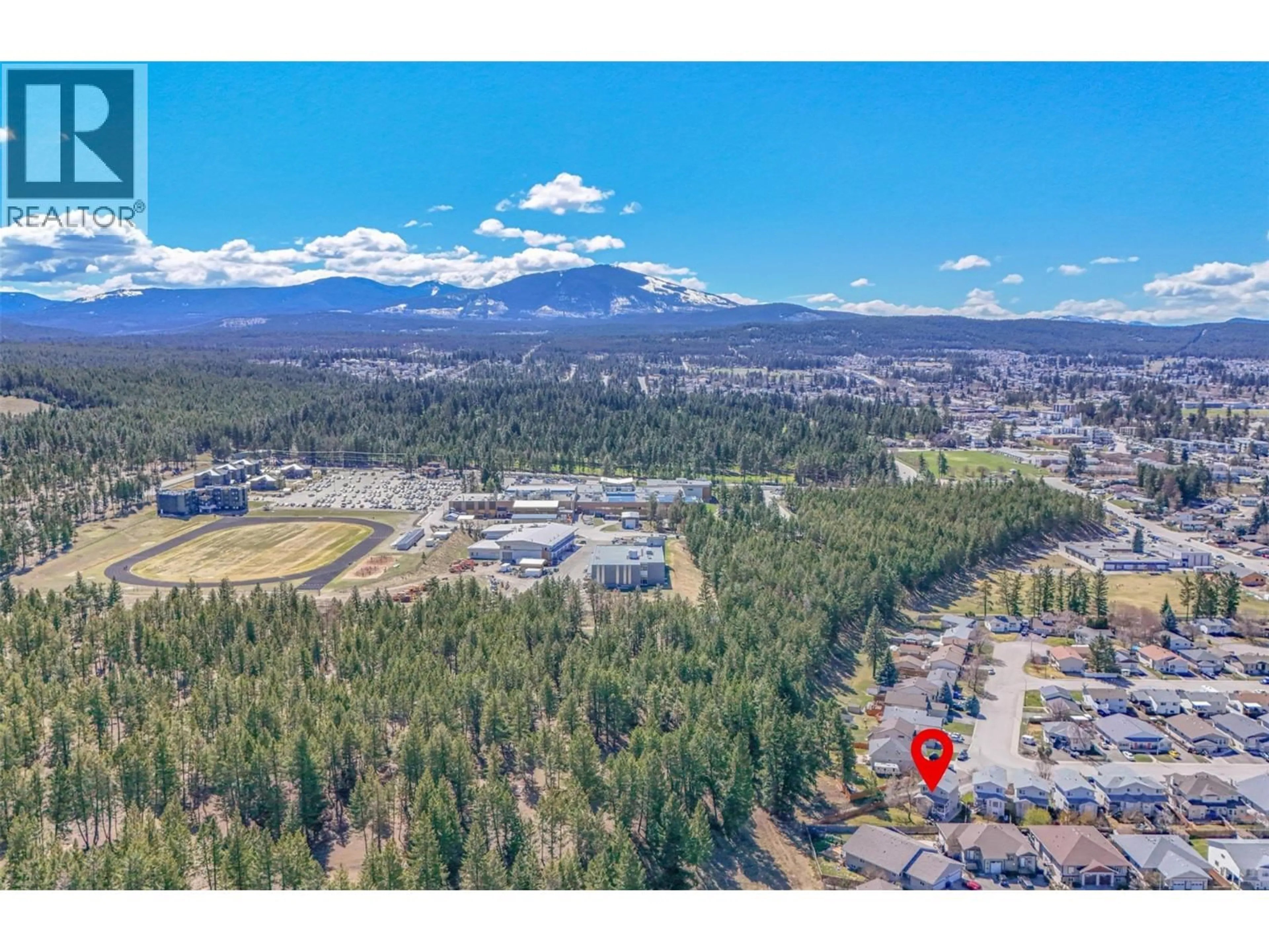 A pic from outside/outdoor area/front of a property/back of a property/a pic from drone, mountain view for 2516b MCLEARY CRESCENT NORTH, Cranbrook British Columbia V1C6R7