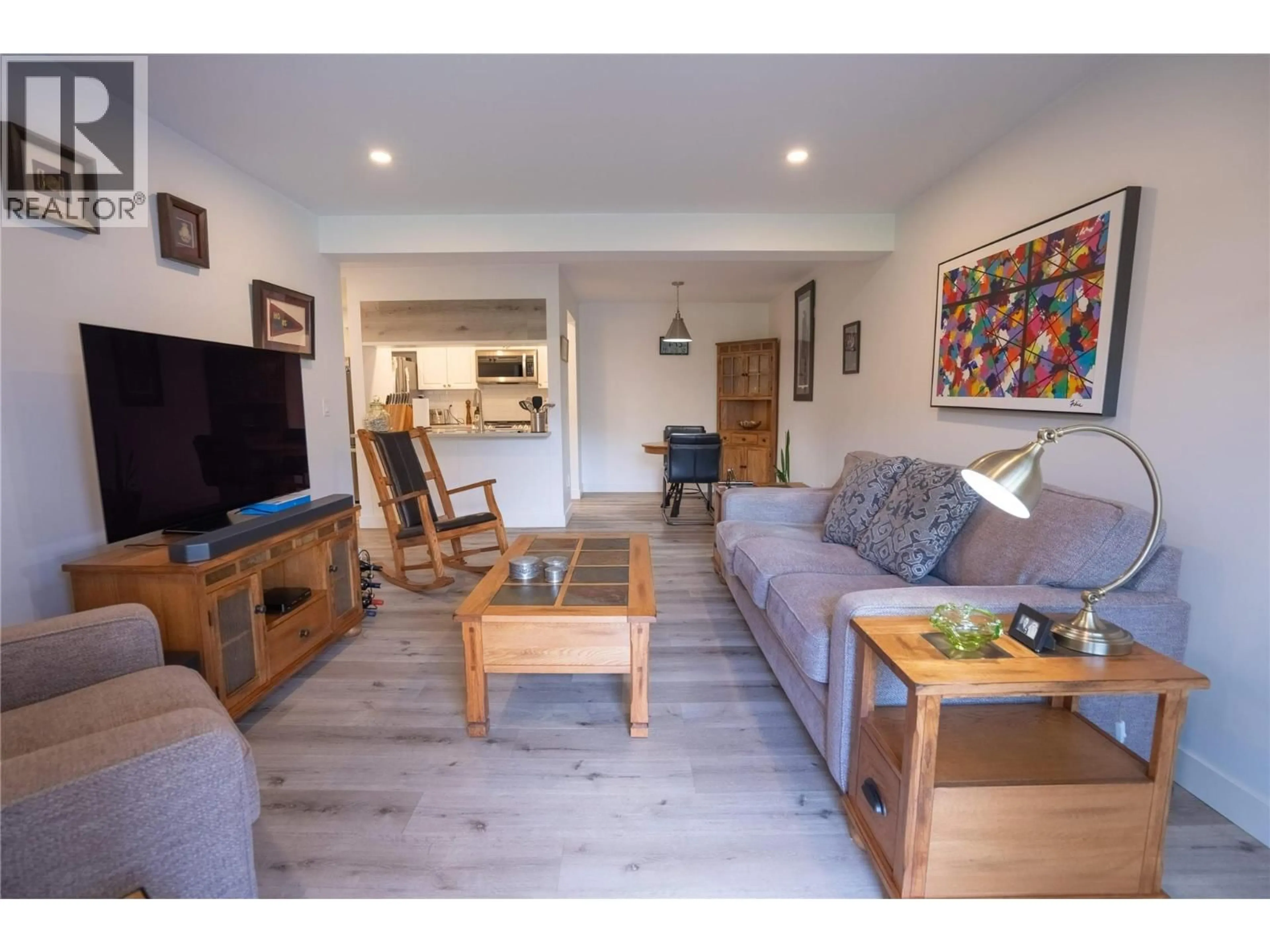 Living room with furniture, wood/laminate floor for 315 - 3140 WILSON STREET, Penticton British Columbia V2A7K4