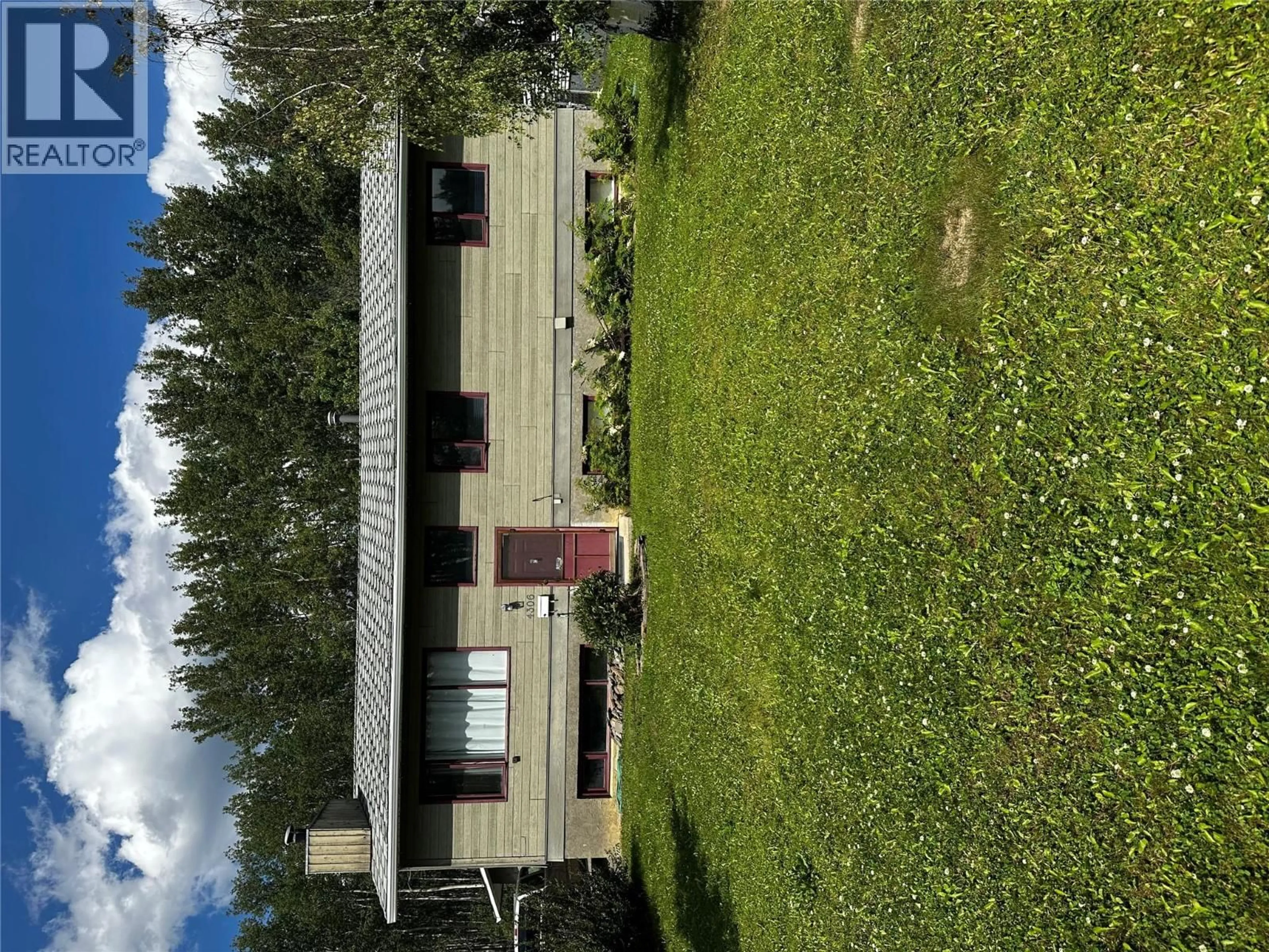 A pic from outside/outdoor area/front of a property/back of a property/a pic from drone, building for 4306 47 AVENUE, Chetwynd British Columbia V0C1J0