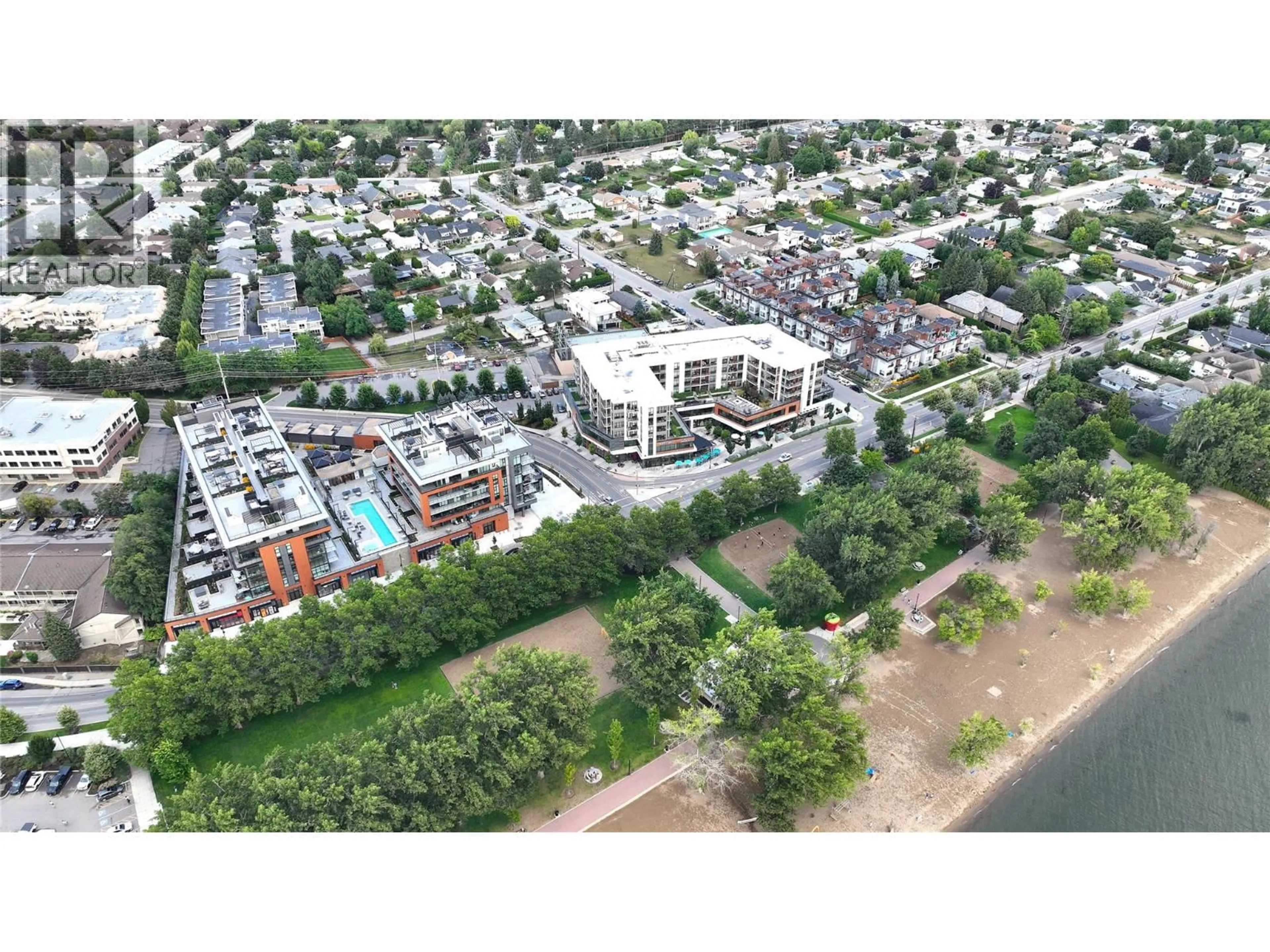 A pic from outside/outdoor area/front of a property/back of a property/a pic from drone, unknown for 305 - 3409 LAKESHORE ROAD, Kelowna British Columbia V1W0G6