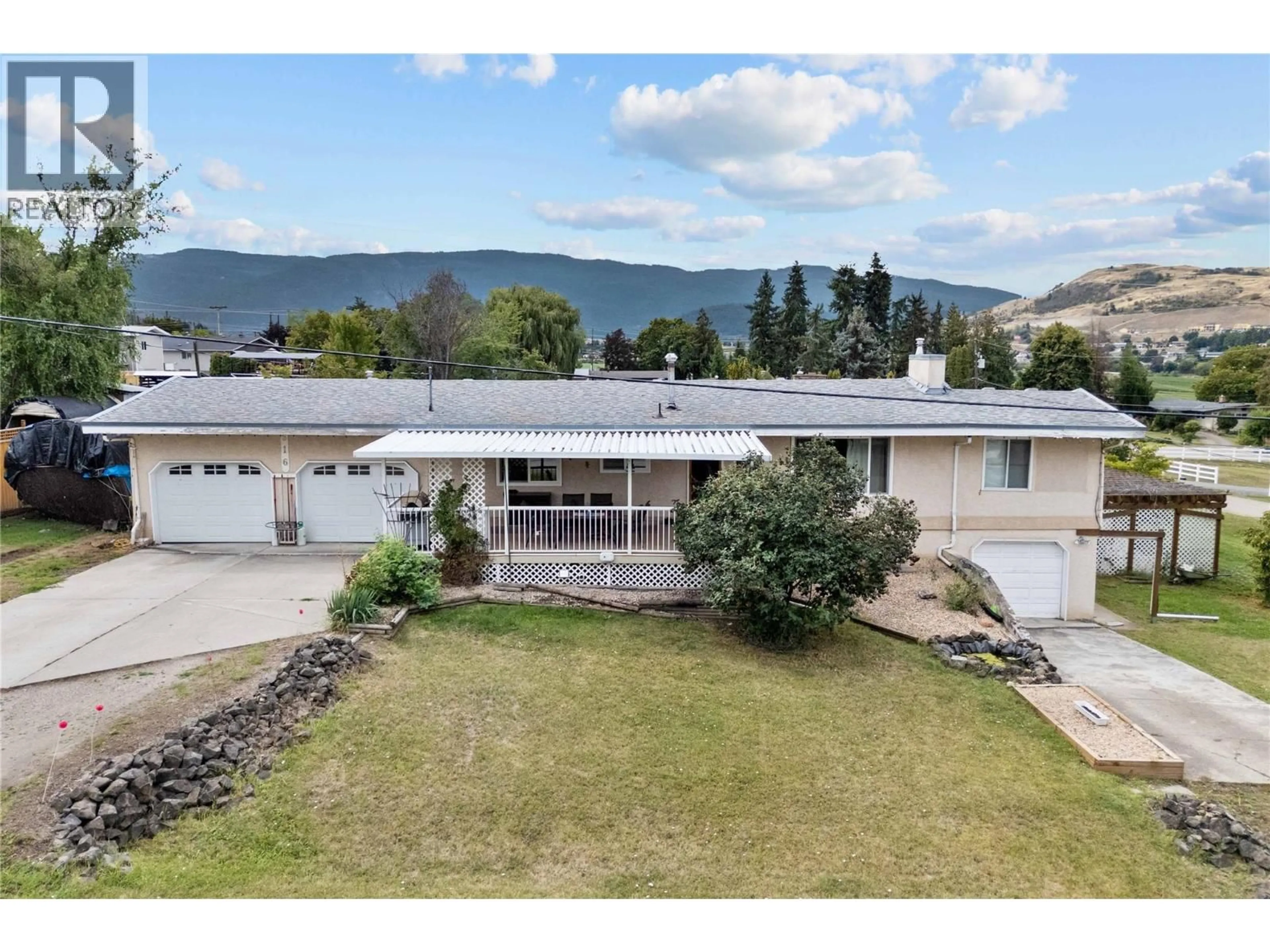 A pic from outside/outdoor area/front of a property/back of a property/a pic from drone, mountain view for 616 DECOSMOS ROAD, Vernon British Columbia V1B3A9