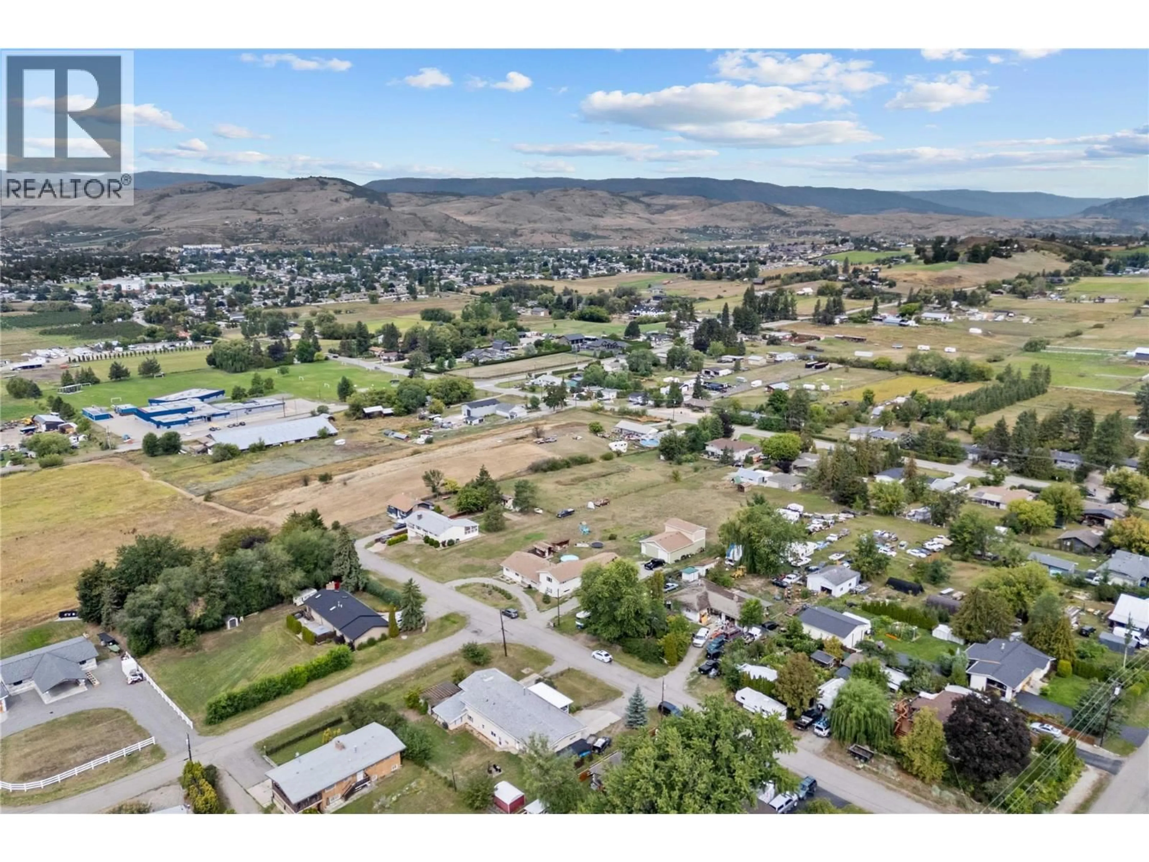 A pic from outside/outdoor area/front of a property/back of a property/a pic from drone, mountain view for 616 DECOSMOS ROAD, Vernon British Columbia V1B3A9