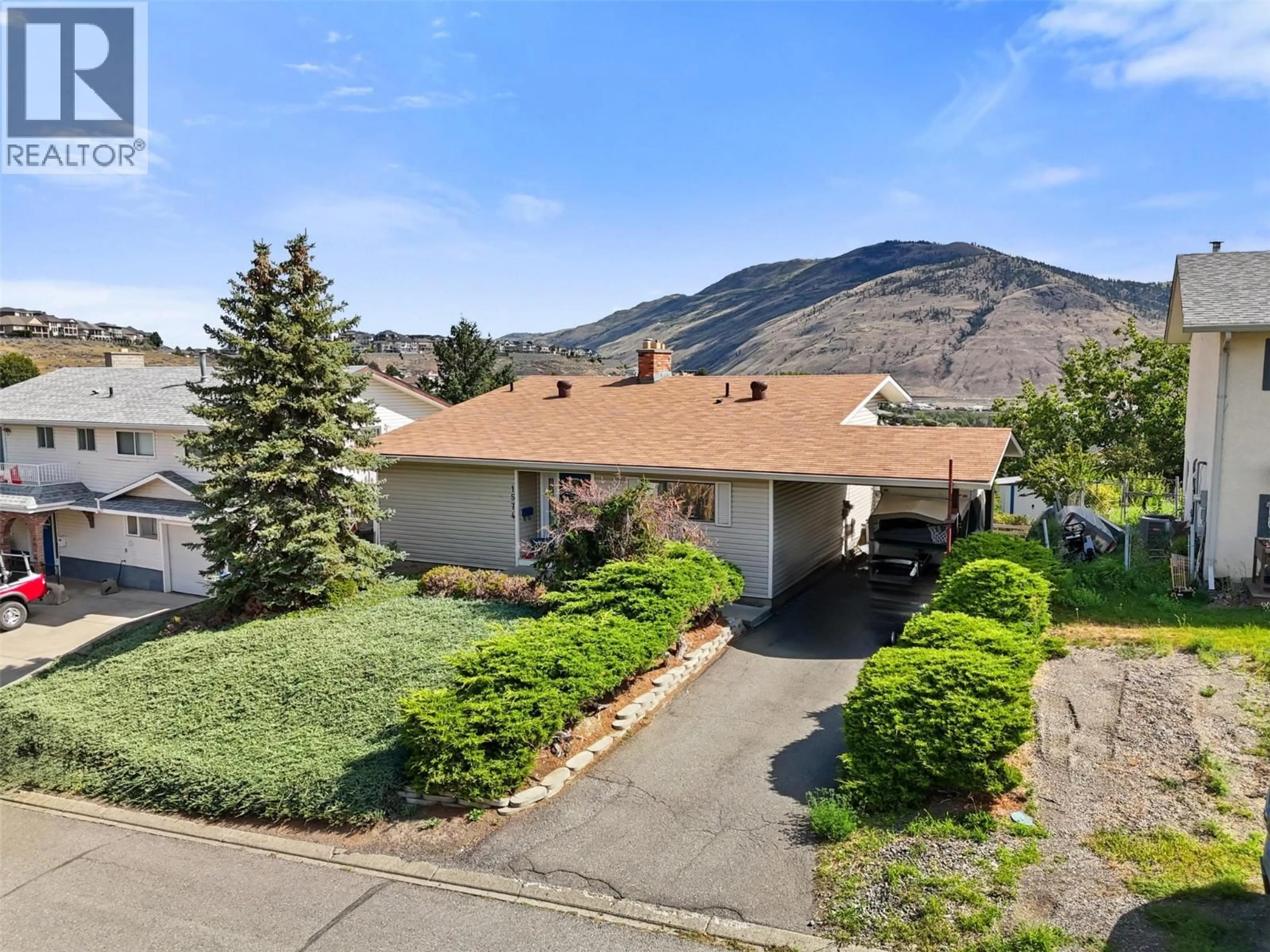 A pic from outside/outdoor area/front of a property/back of a property/a pic from drone, mountain view for 1574 GRIFFIN TERRACE, Kamloops British Columbia V2B7R6