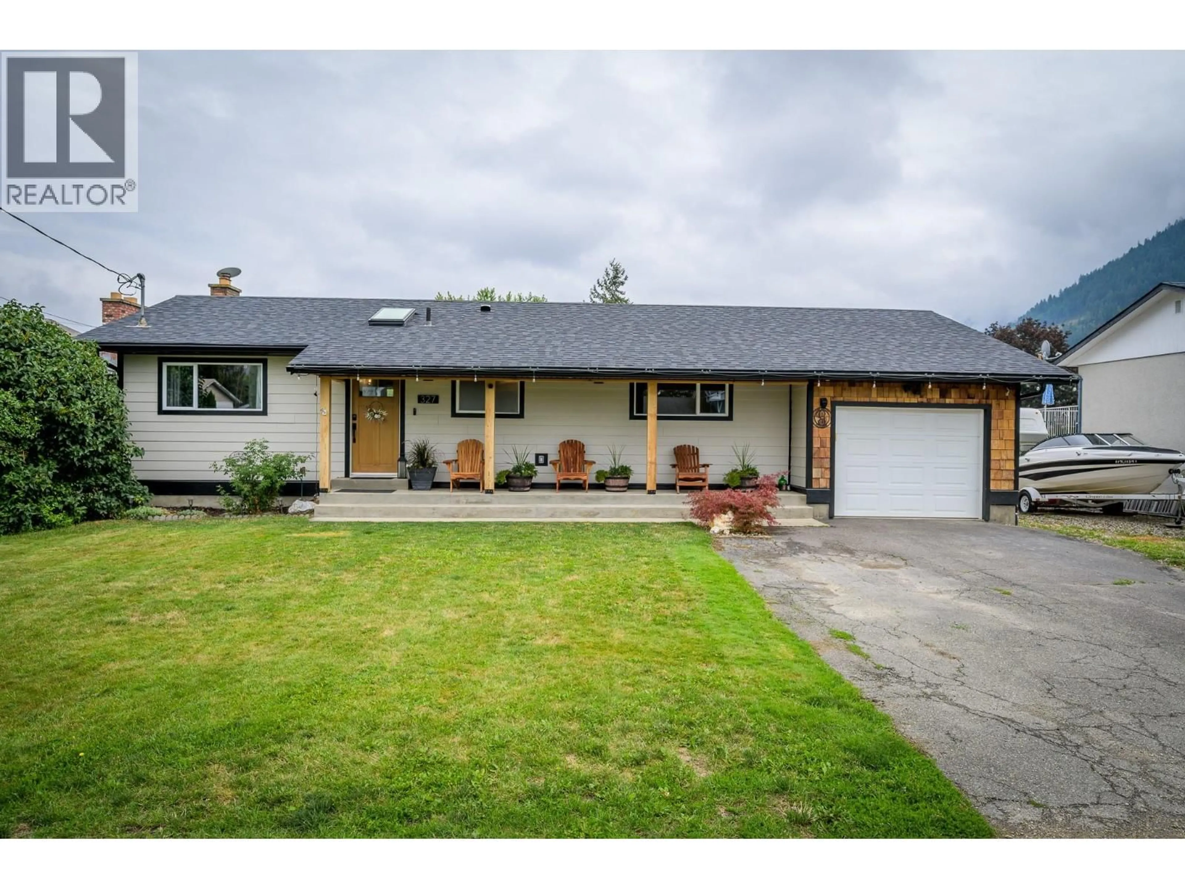 Home with vinyl exterior material, street for 327 ASPEN DRIVE, Chase British Columbia V0E1M0