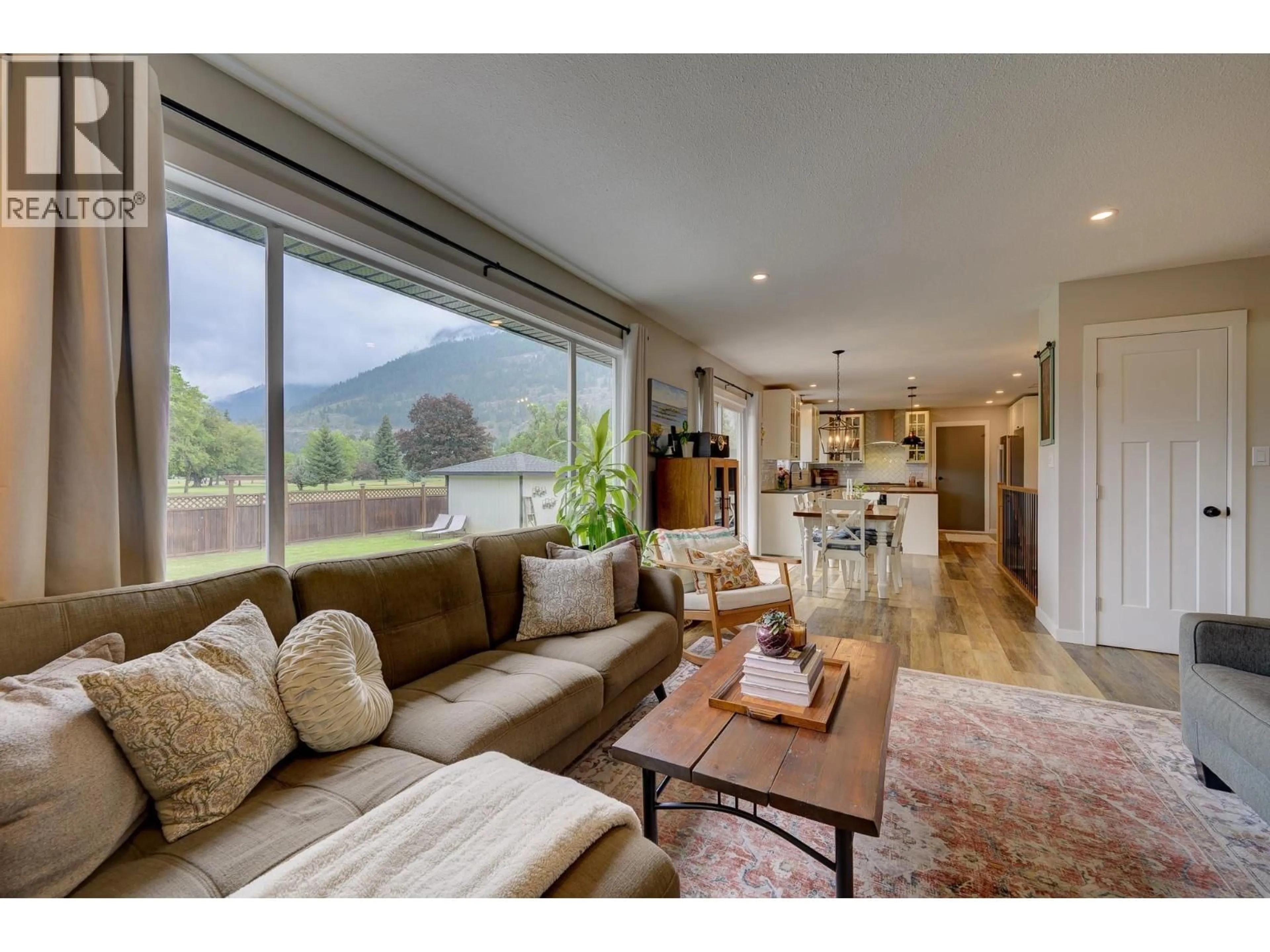 Living room with furniture, wood/laminate floor for 327 ASPEN DRIVE, Chase British Columbia V0E1M0