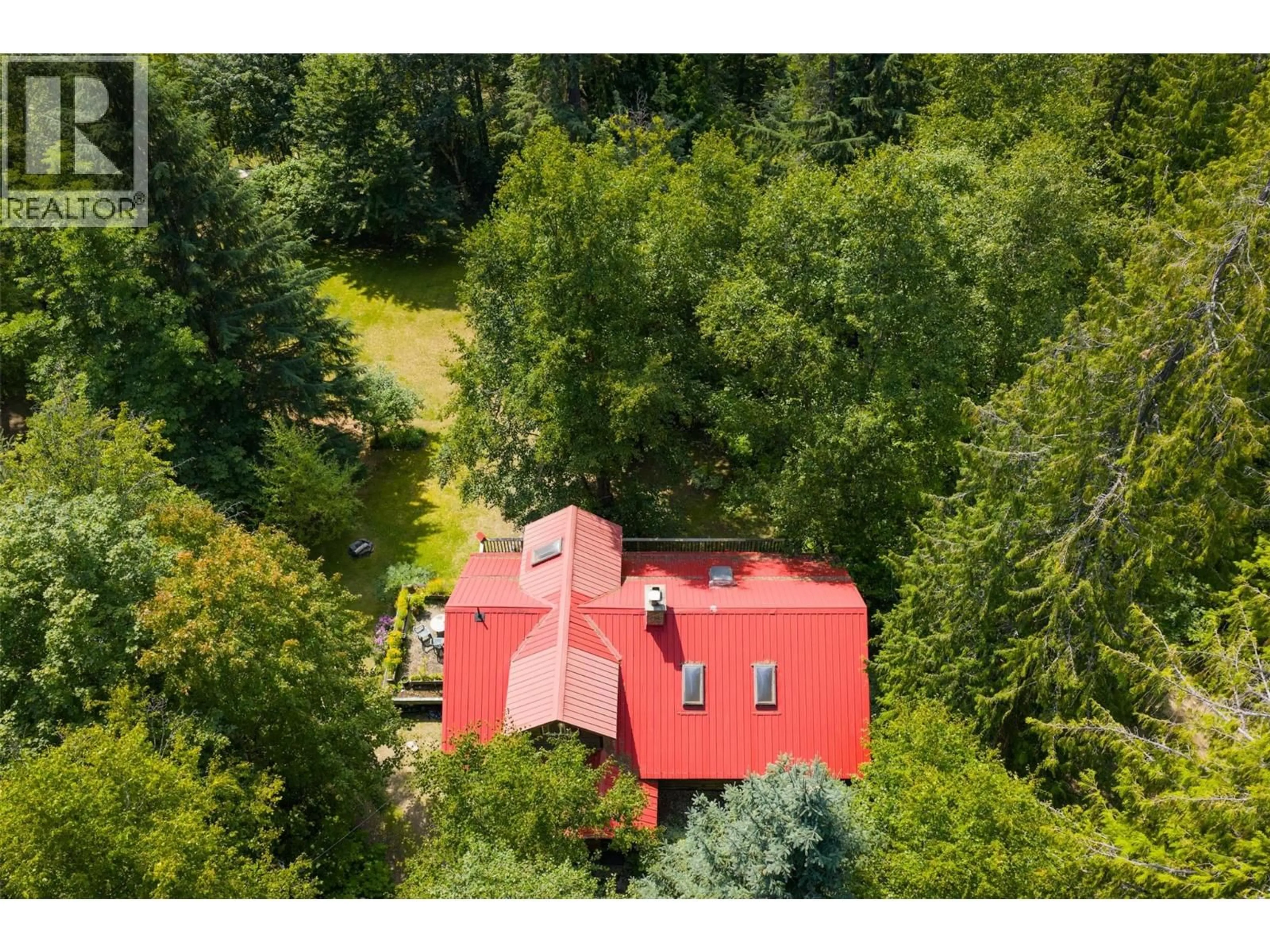 A pic from outside/outdoor area/front of a property/back of a property/a pic from drone, building for 1506 HIGHWAY 31A HIGHWAY, New Denver British Columbia V0G1S0