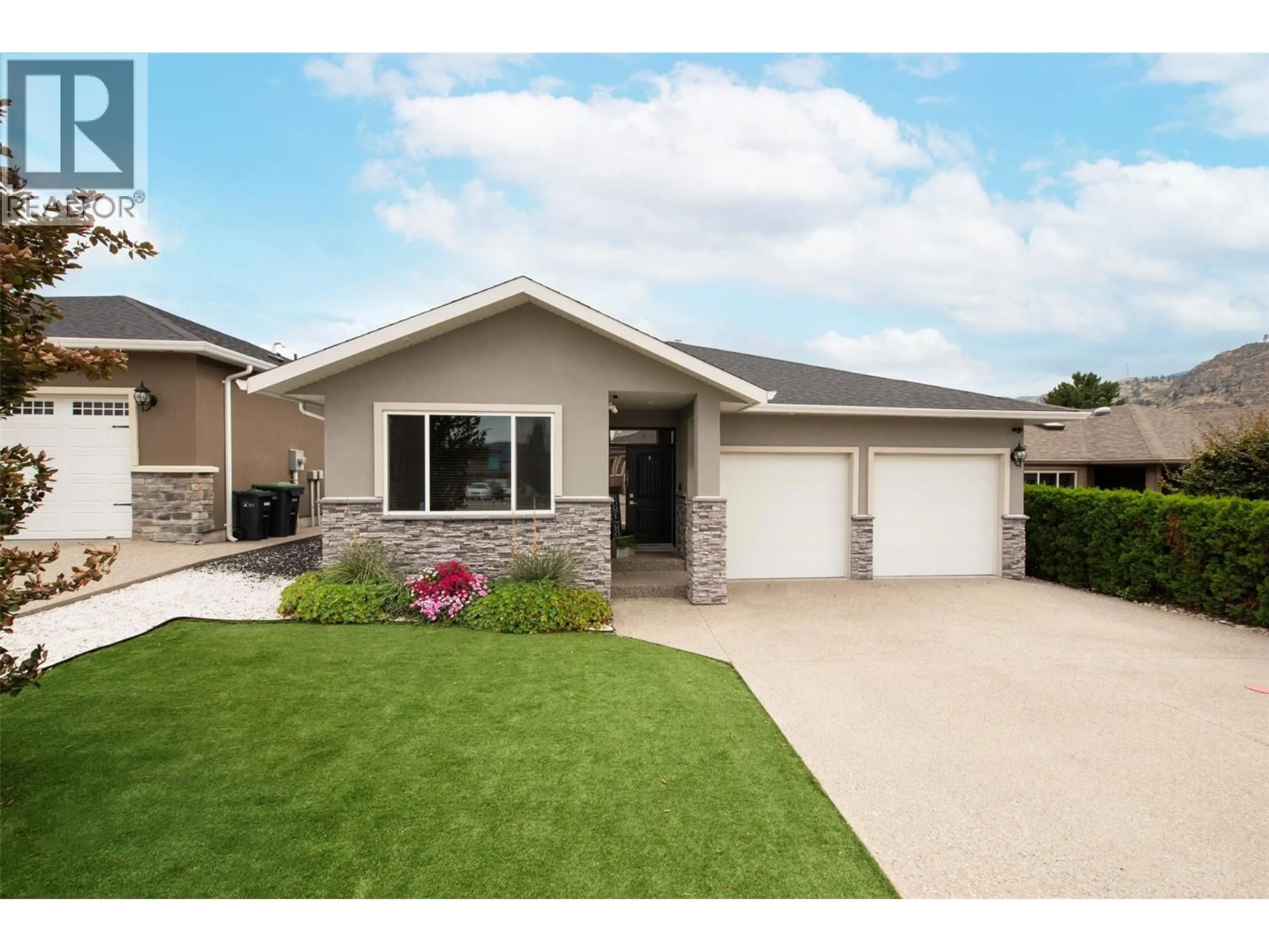 Home with vinyl exterior material, street for 361 CHARDONNAY AVENUE, Oliver British Columbia V0H1T4