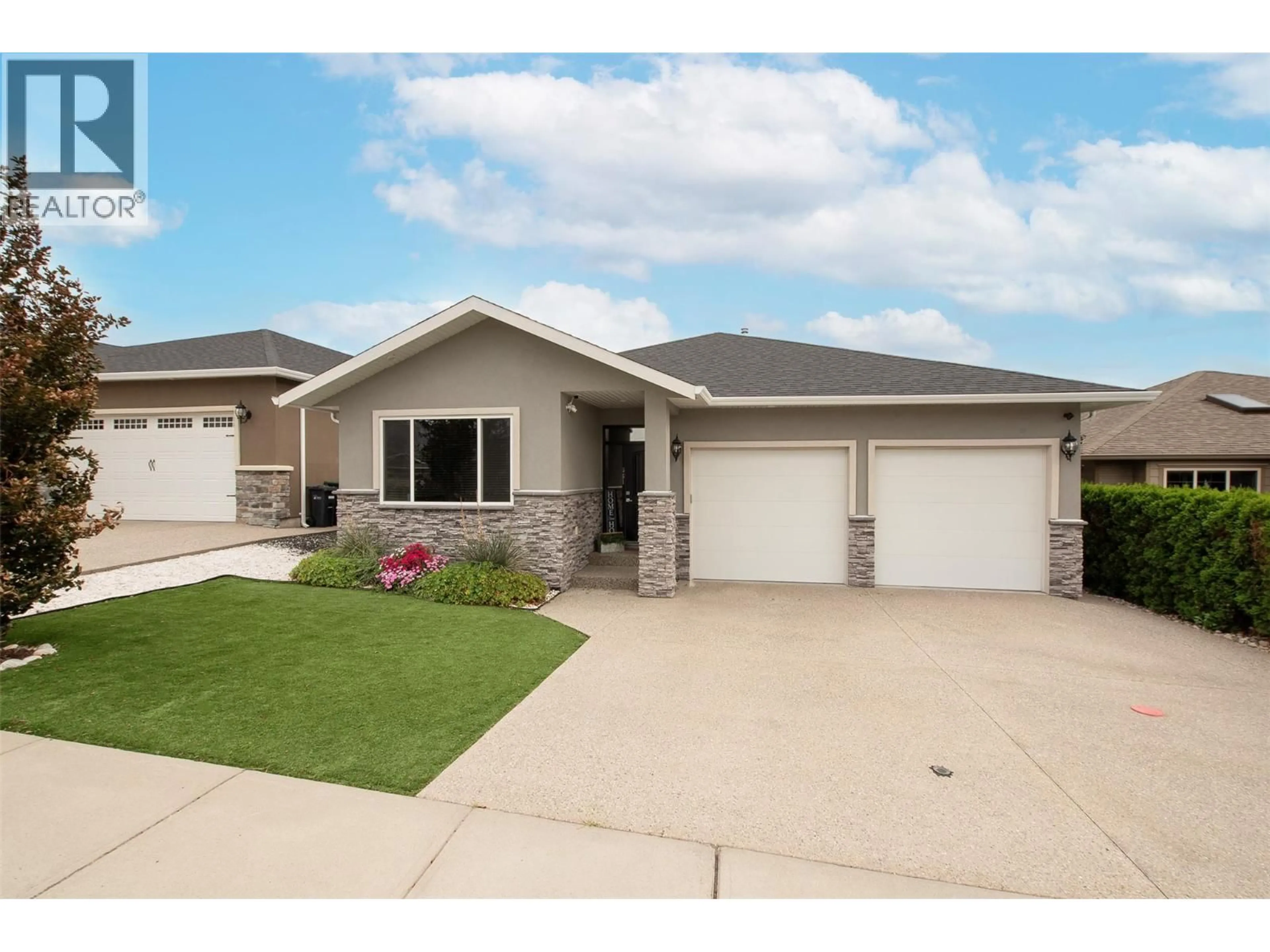 Home with vinyl exterior material, street for 361 CHARDONNAY AVENUE, Oliver British Columbia V0H1T4