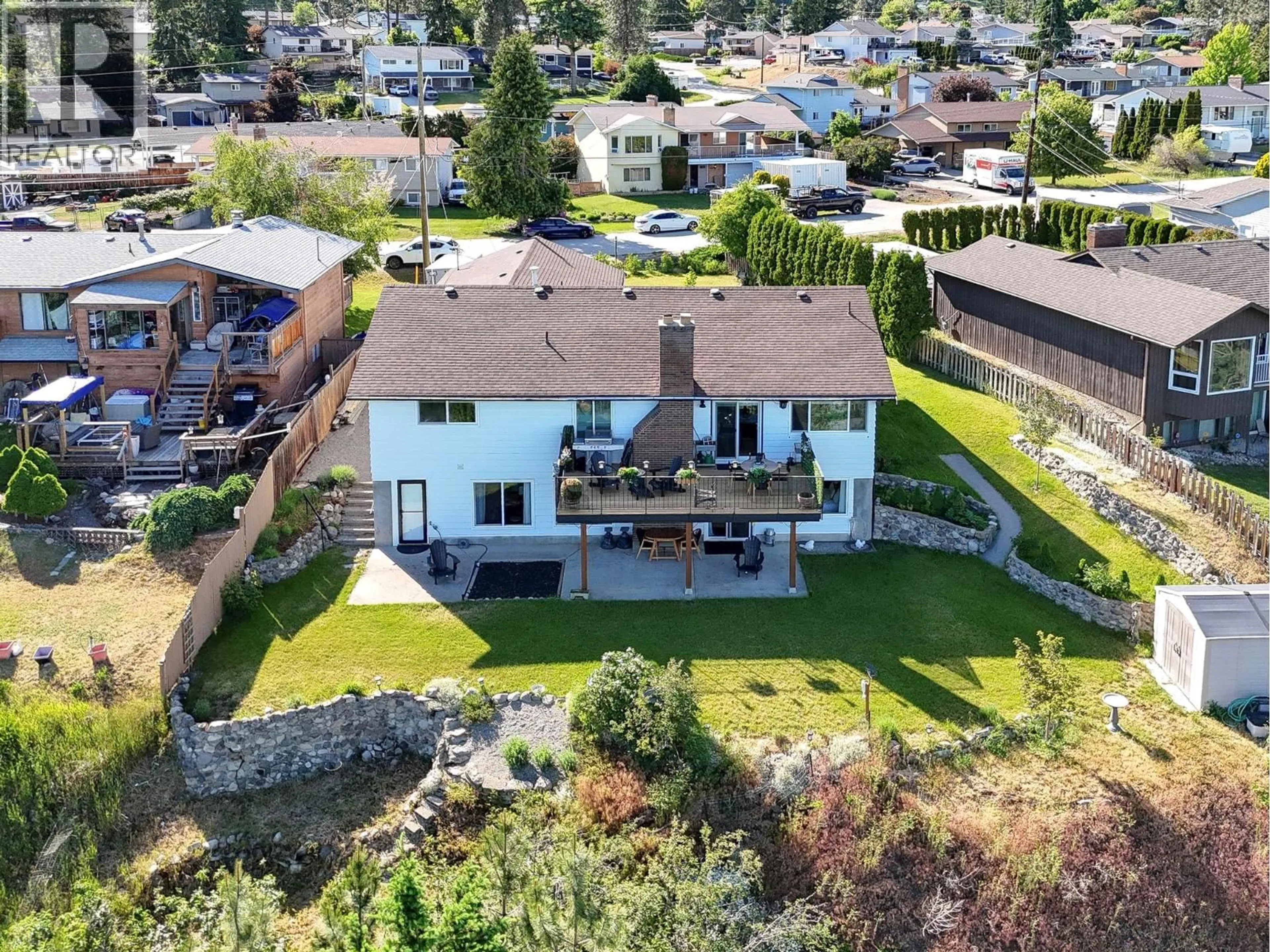 A pic from outside/outdoor area/front of a property/back of a property/a pic from drone, mountain view for 3371 MCMURCHIE ROAD, West Kelowna British Columbia V4T1B4