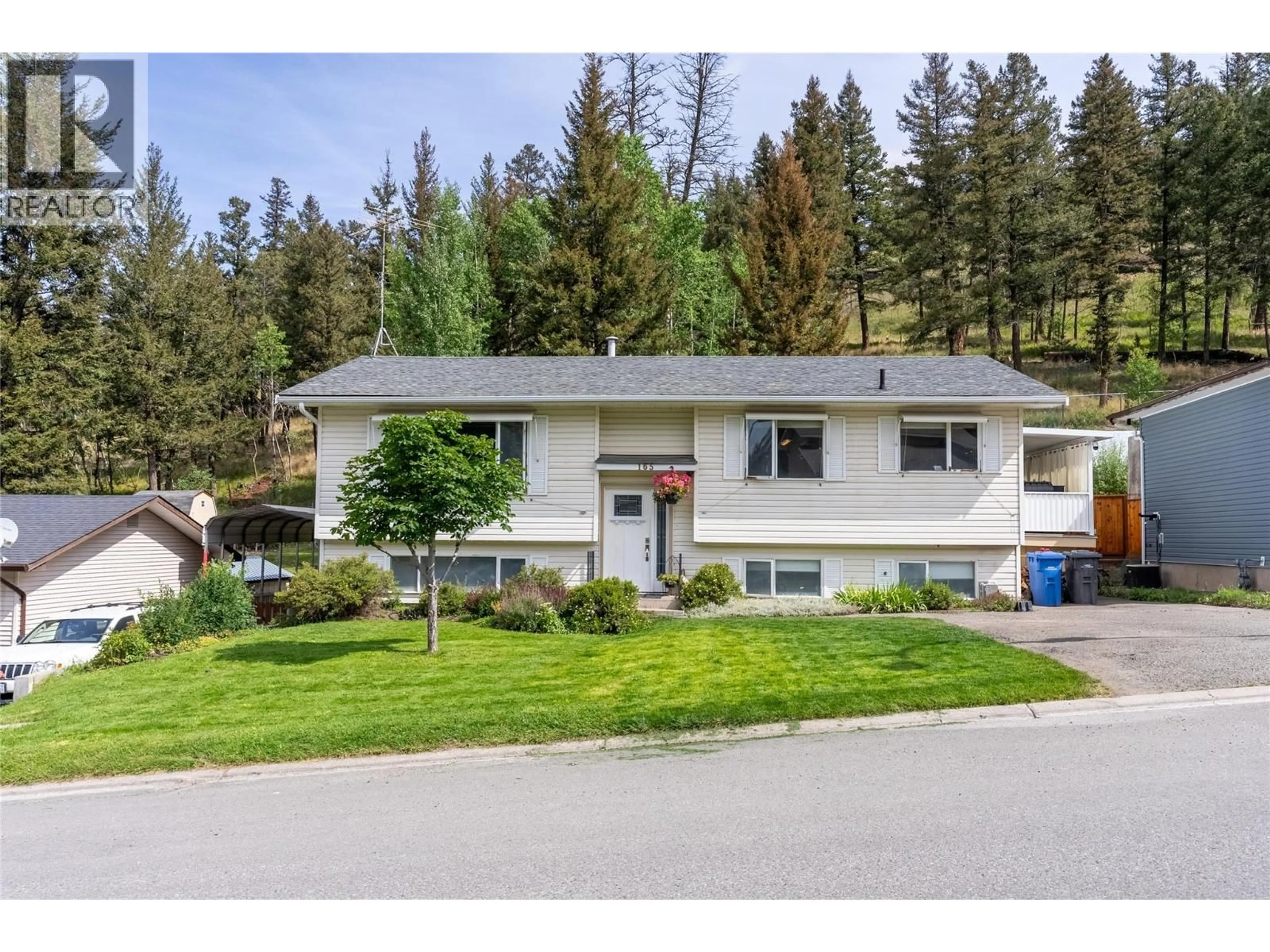 Home with vinyl exterior material, street for 165 JASPER DRIVE, Logan Lake British Columbia V0K1W0