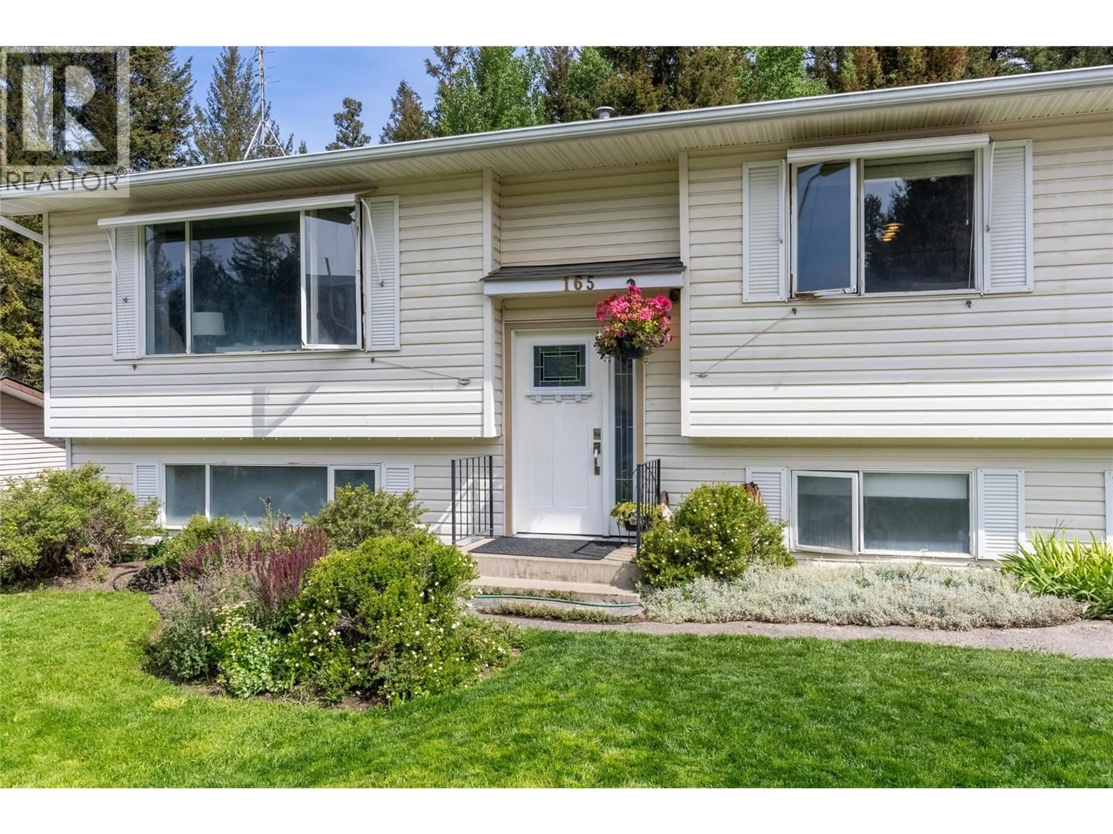 Home with vinyl exterior material, street for 165 JASPER DRIVE, Logan Lake British Columbia V0K1W0
