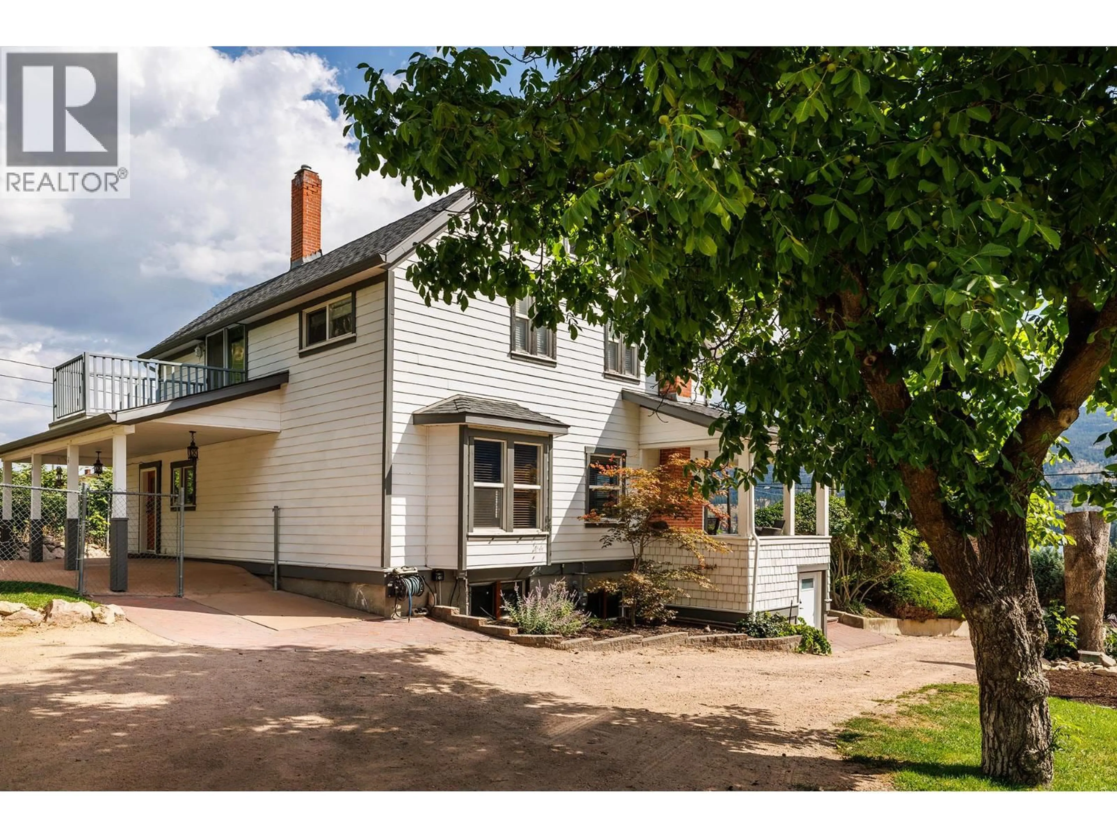 A pic from outside/outdoor area/front of a property/back of a property/a pic from drone, street for 15818 OLD MISSION ROAD, Lake Country British Columbia V4V2G8