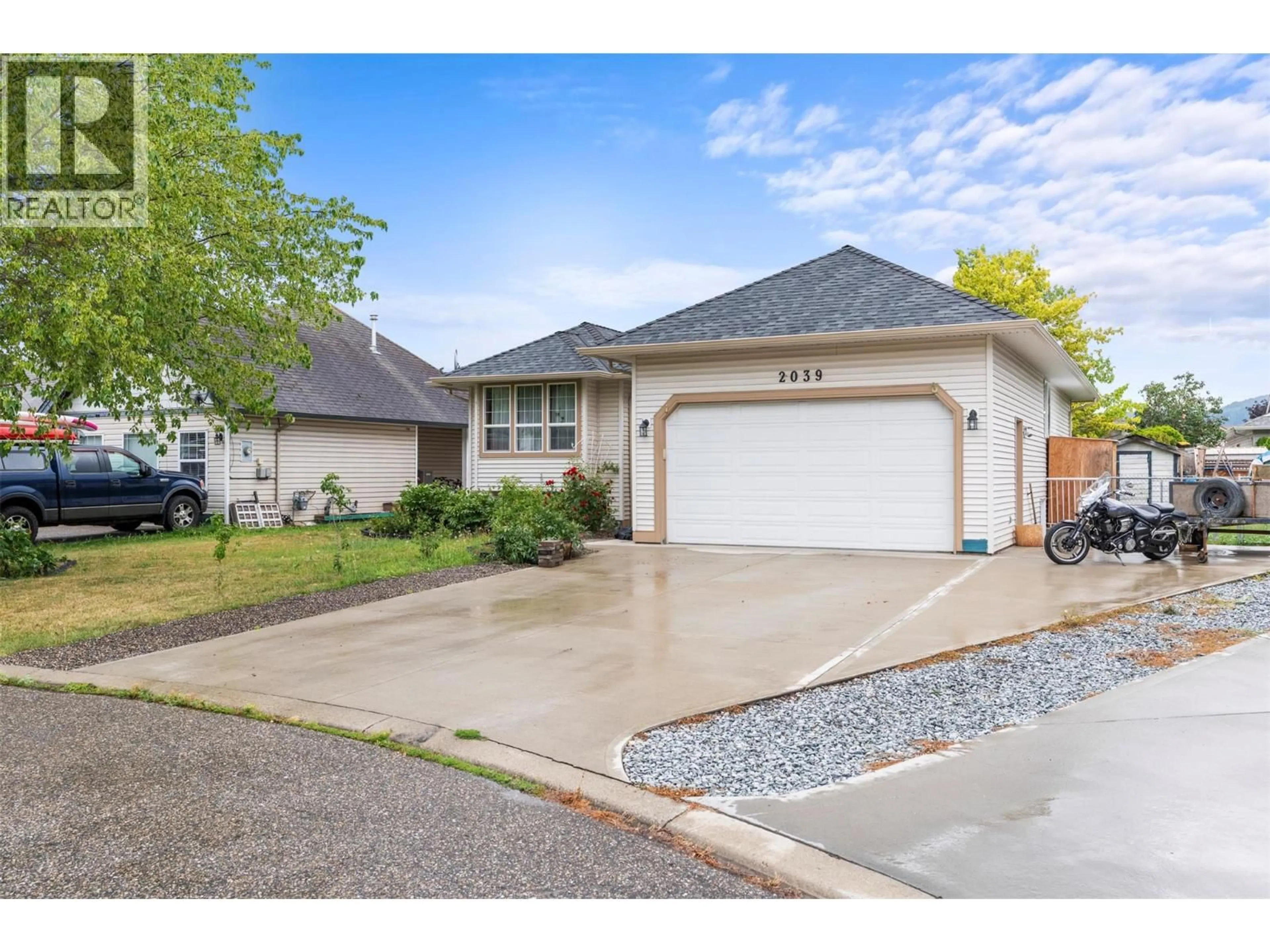 Home with vinyl exterior material, street for 2039 GAME COURT, Armstrong British Columbia V0E1B0
