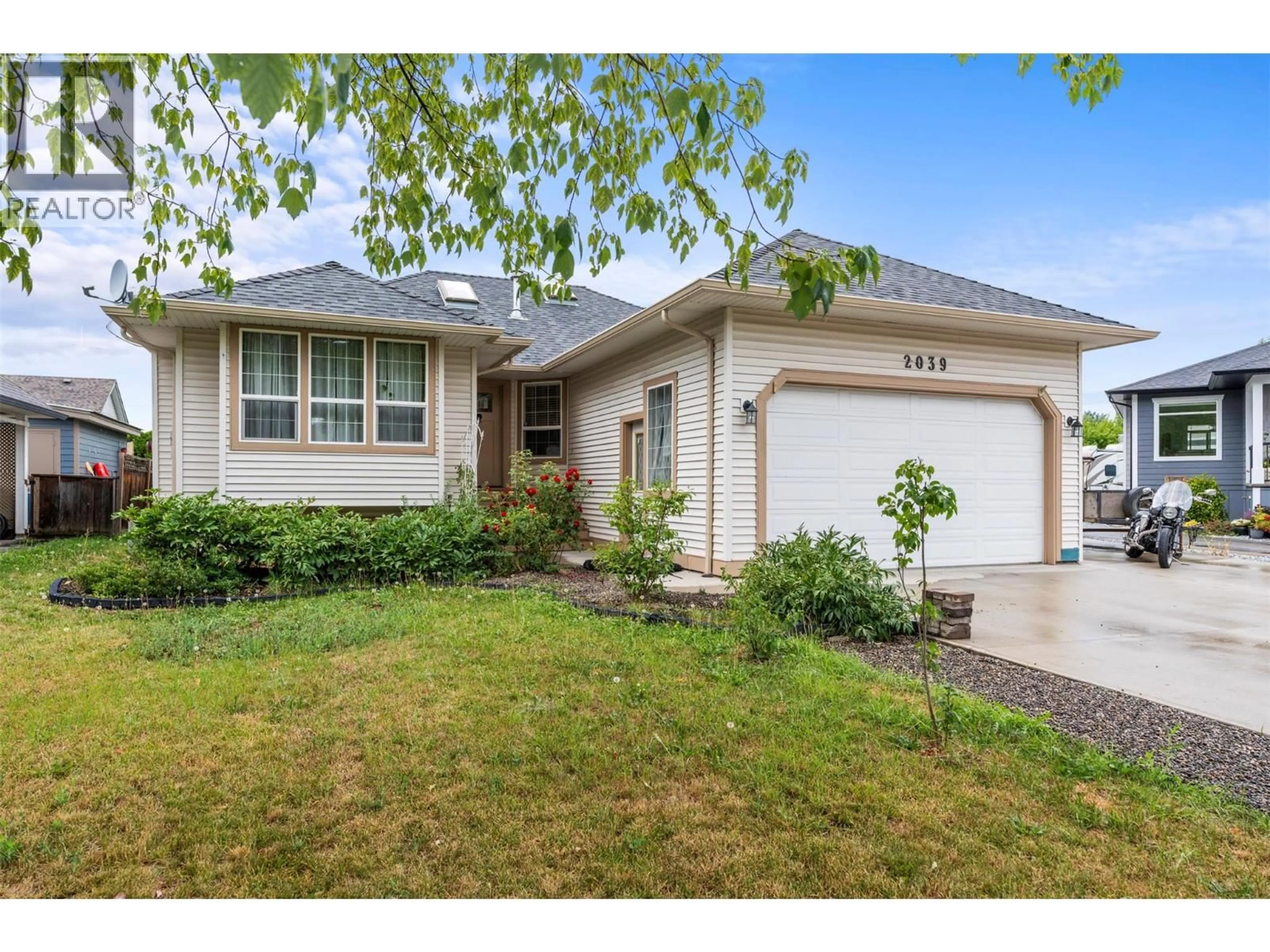 Home with vinyl exterior material, street for 2039 GAME COURT, Armstrong British Columbia V0E1B0
