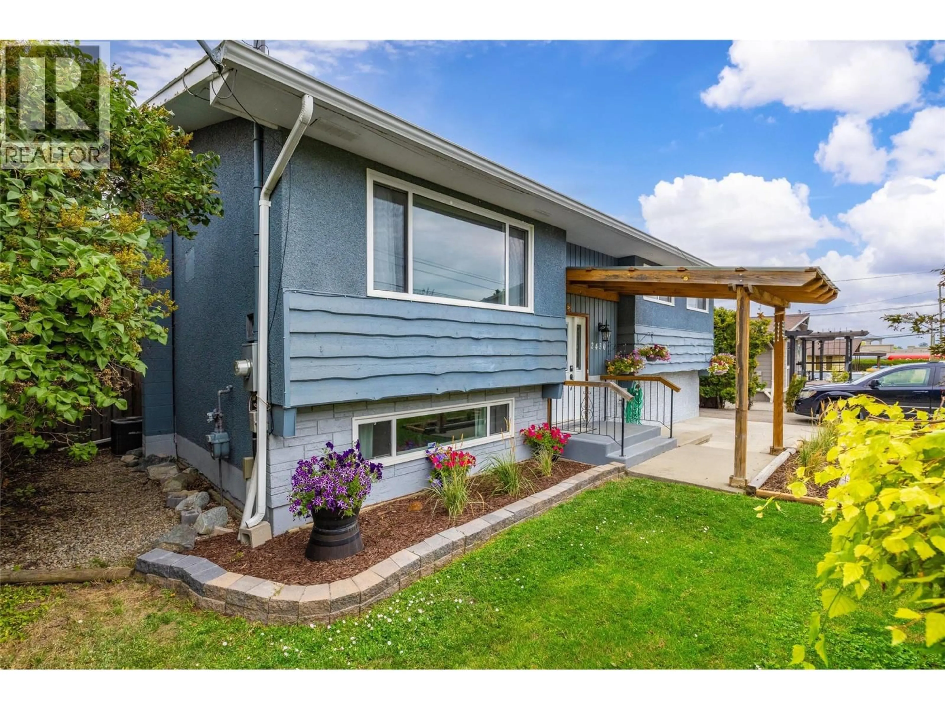 Home with vinyl exterior material, street for 2430 APOLLO ROAD, West Kelowna British Columbia V4T1P6