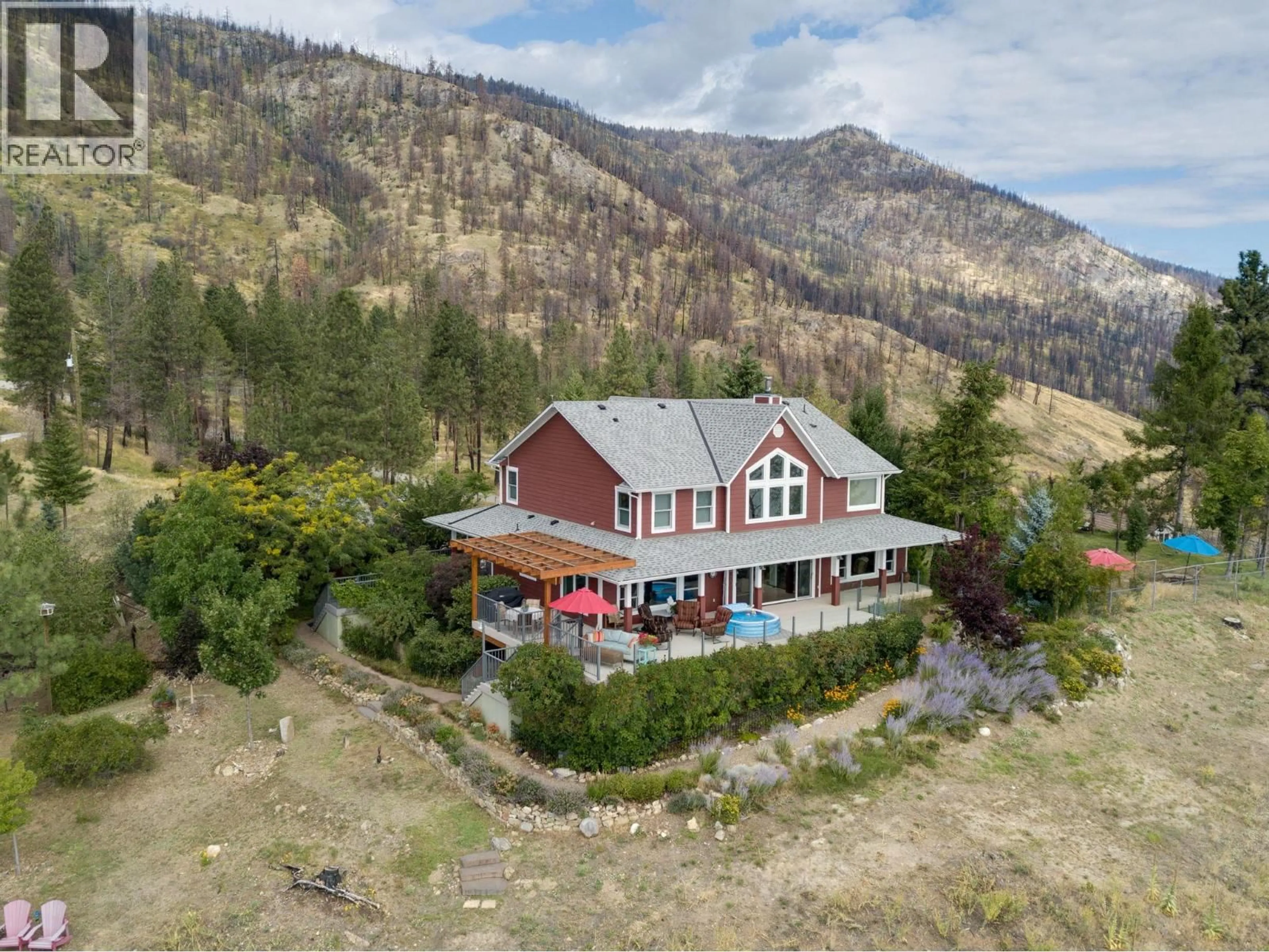 A pic from outside/outdoor area/front of a property/back of a property/a pic from drone, mountain view for 9 - 1750 WESTSIDE ROAD NORTH, Kelowna British Columbia V1Z3R9