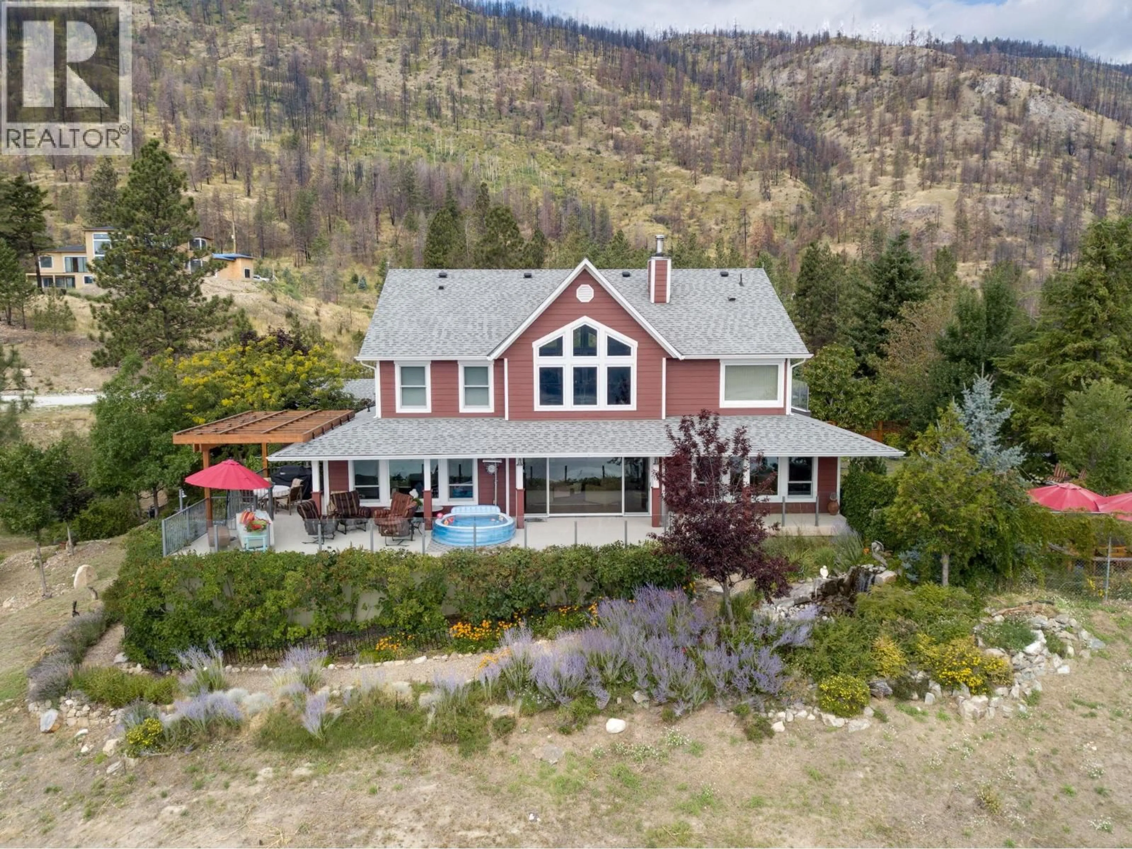 A pic from outside/outdoor area/front of a property/back of a property/a pic from drone, unknown for 9 - 1750 WESTSIDE ROAD NORTH, Kelowna British Columbia V1Z3R9