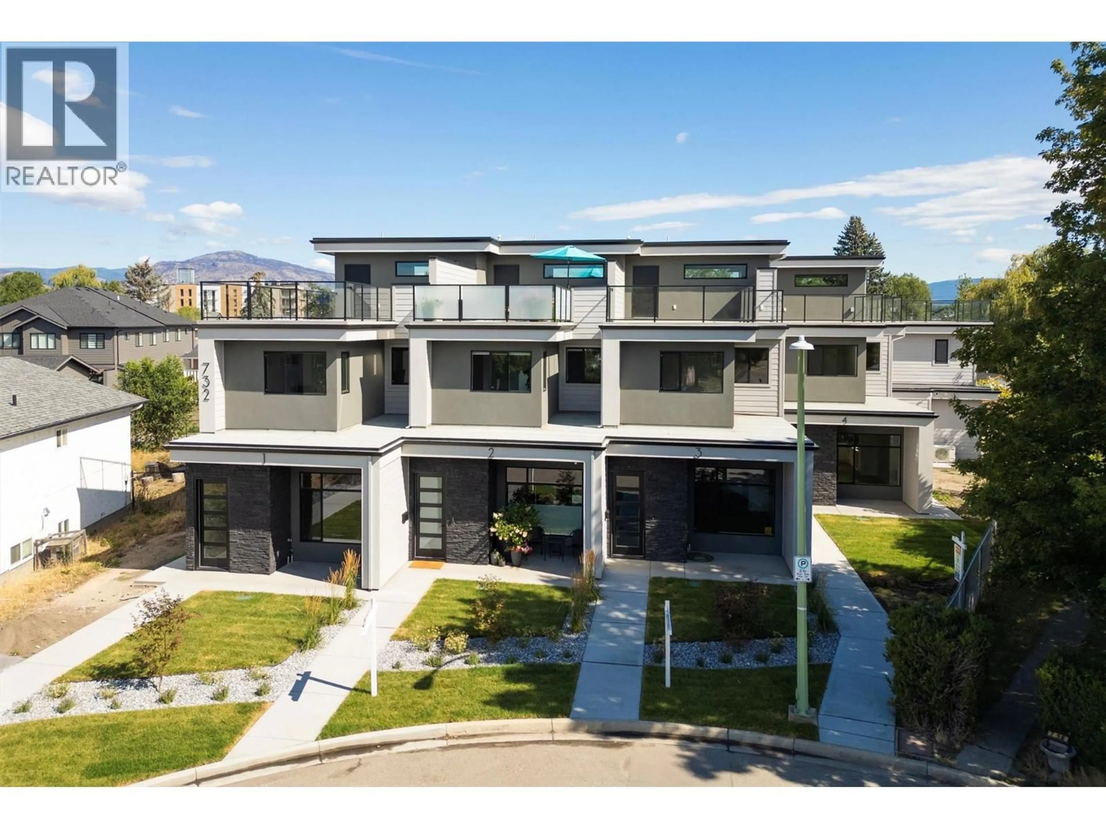 A pic from outside/outdoor area/front of a property/back of a property/a pic from drone, unknown for 1 - 732 COOPLAND CRESCENT, Kelowna British Columbia V1Y2V1