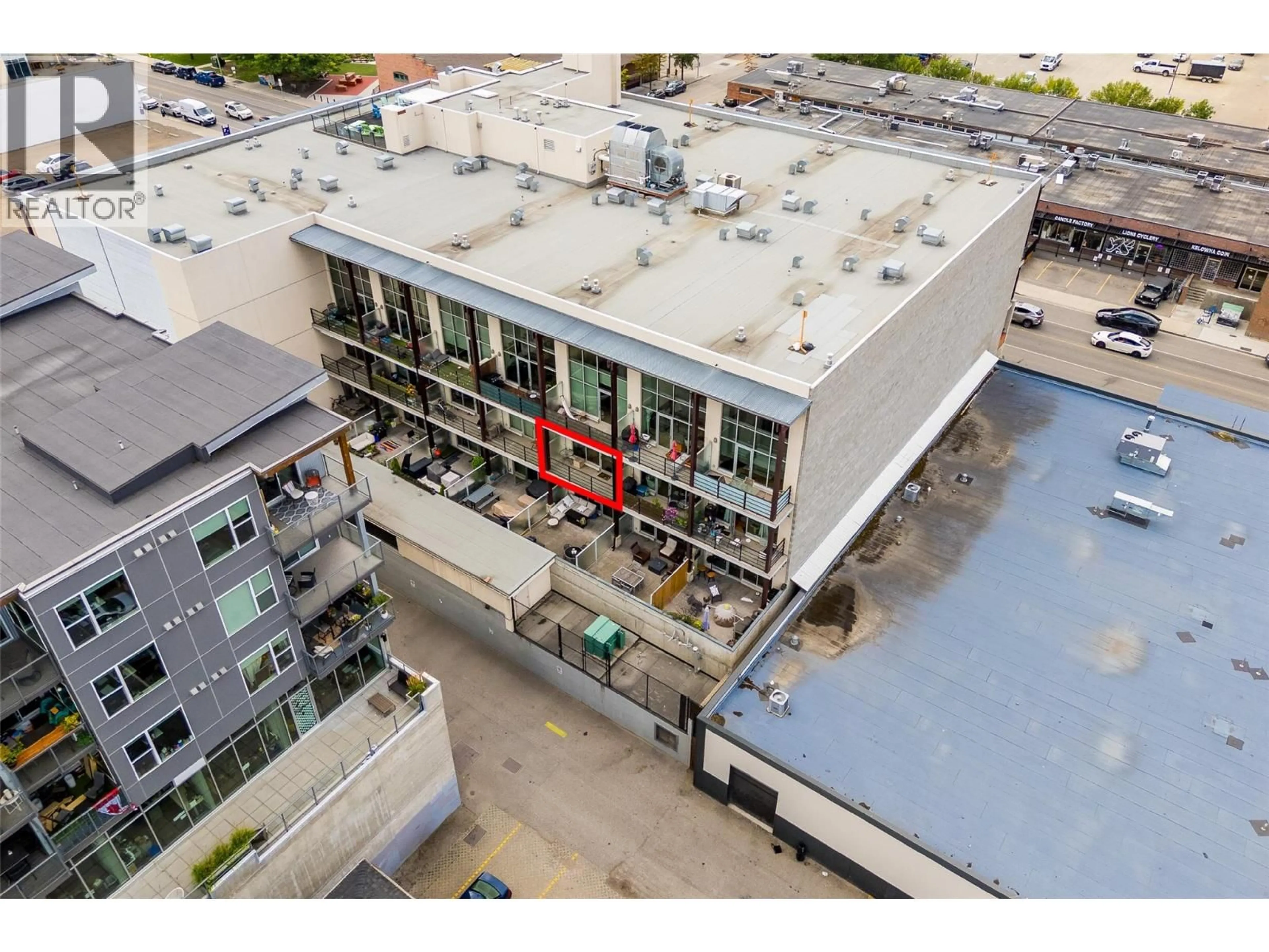 A pic from outside/outdoor area/front of a property/back of a property/a pic from drone, building for 316 - 1289 ELLIS STREET, Kelowna British Columbia V1Y9X6