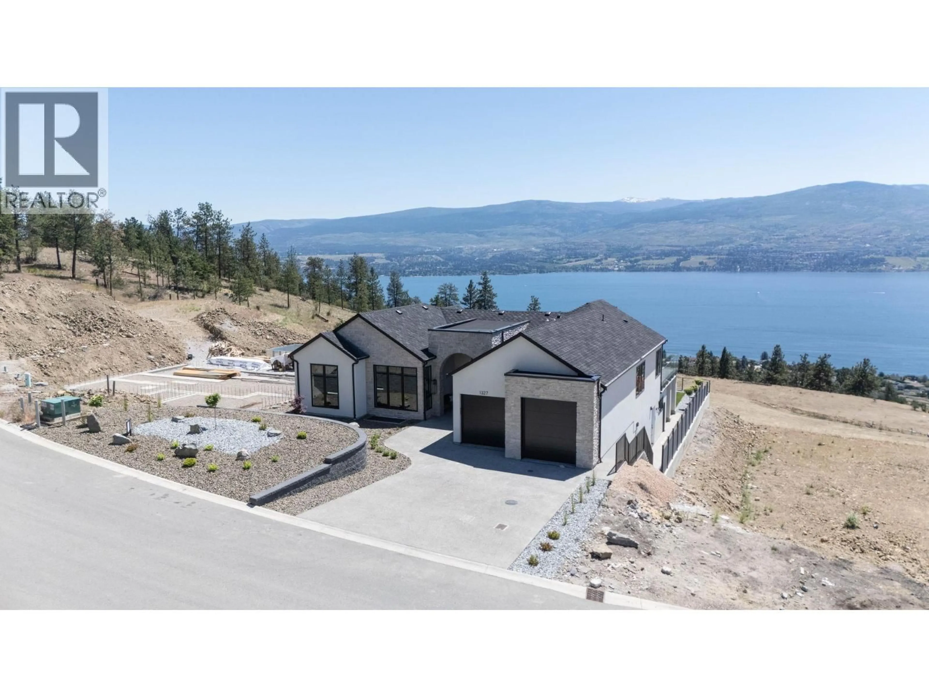 A pic from outside/outdoor area/front of a property/back of a property/a pic from drone, water/lake/river/ocean view for 1327 VINEYARD DRIVE, West Kelowna British Columbia V4T3H9