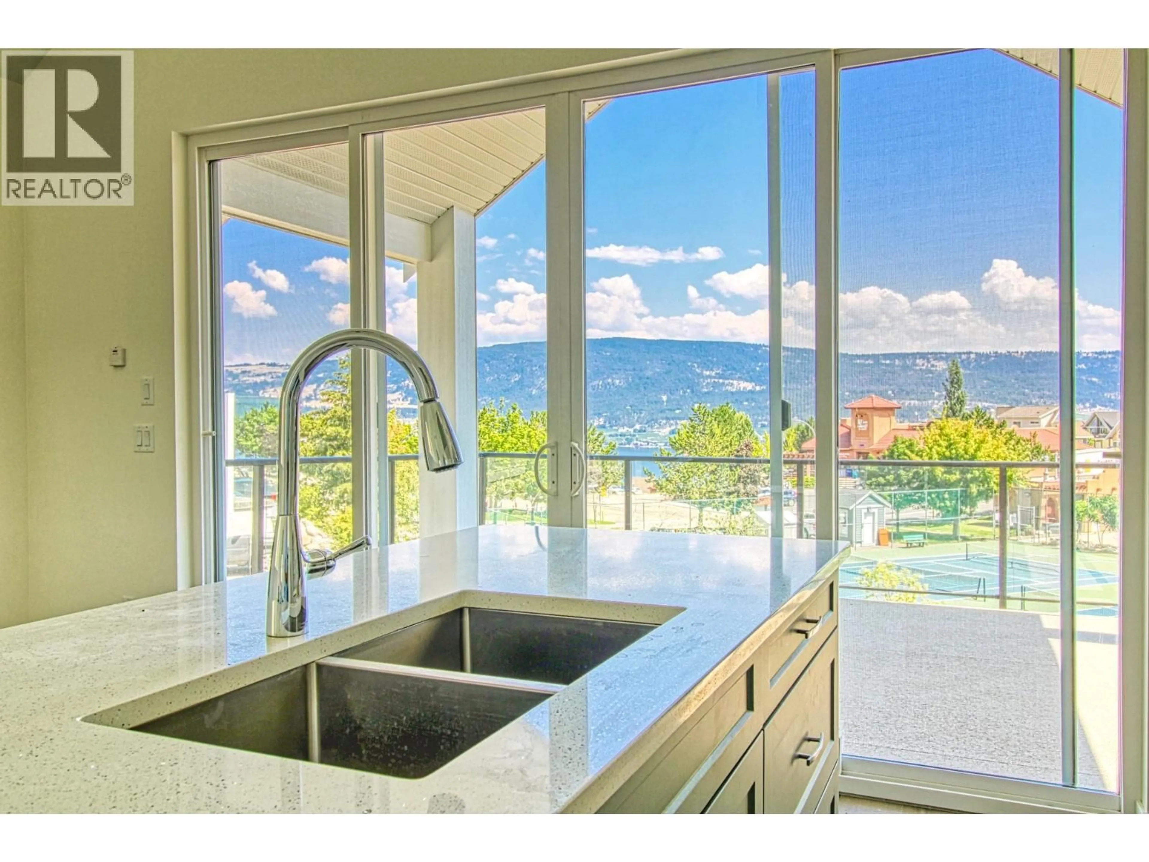Contemporary kitchen, ceramic/tile floor for 336 - 6857 MADRID WAY, Kelowna British Columbia V1Z3R8