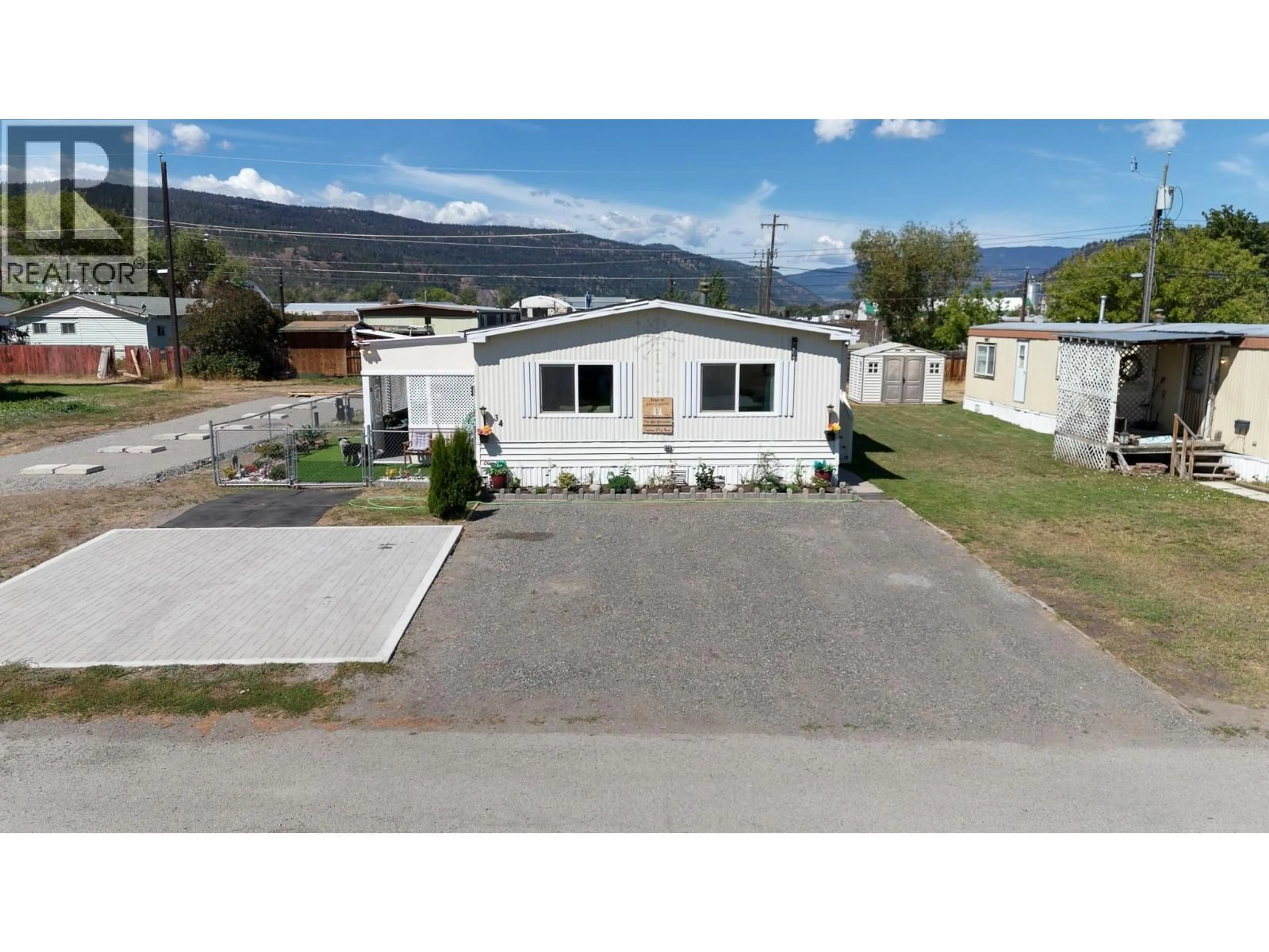 A pic from outside/outdoor area/front of a property/back of a property/a pic from drone, unknown for 34 - 2776 CLAPPERTON AVENUE, Merritt British Columbia V1K1G5