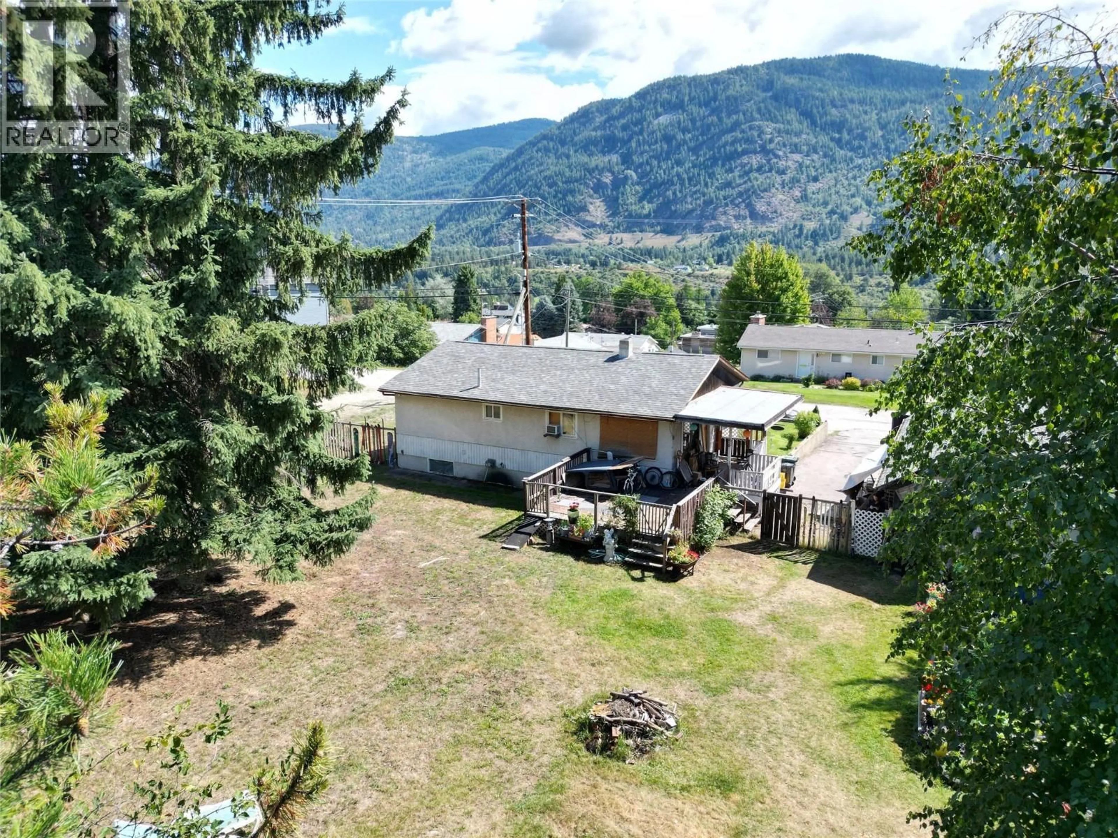 A pic from outside/outdoor area/front of a property/back of a property/a pic from drone, mountain view for 3300 5TH AVENUE, Castlegar British Columbia V1N2V5