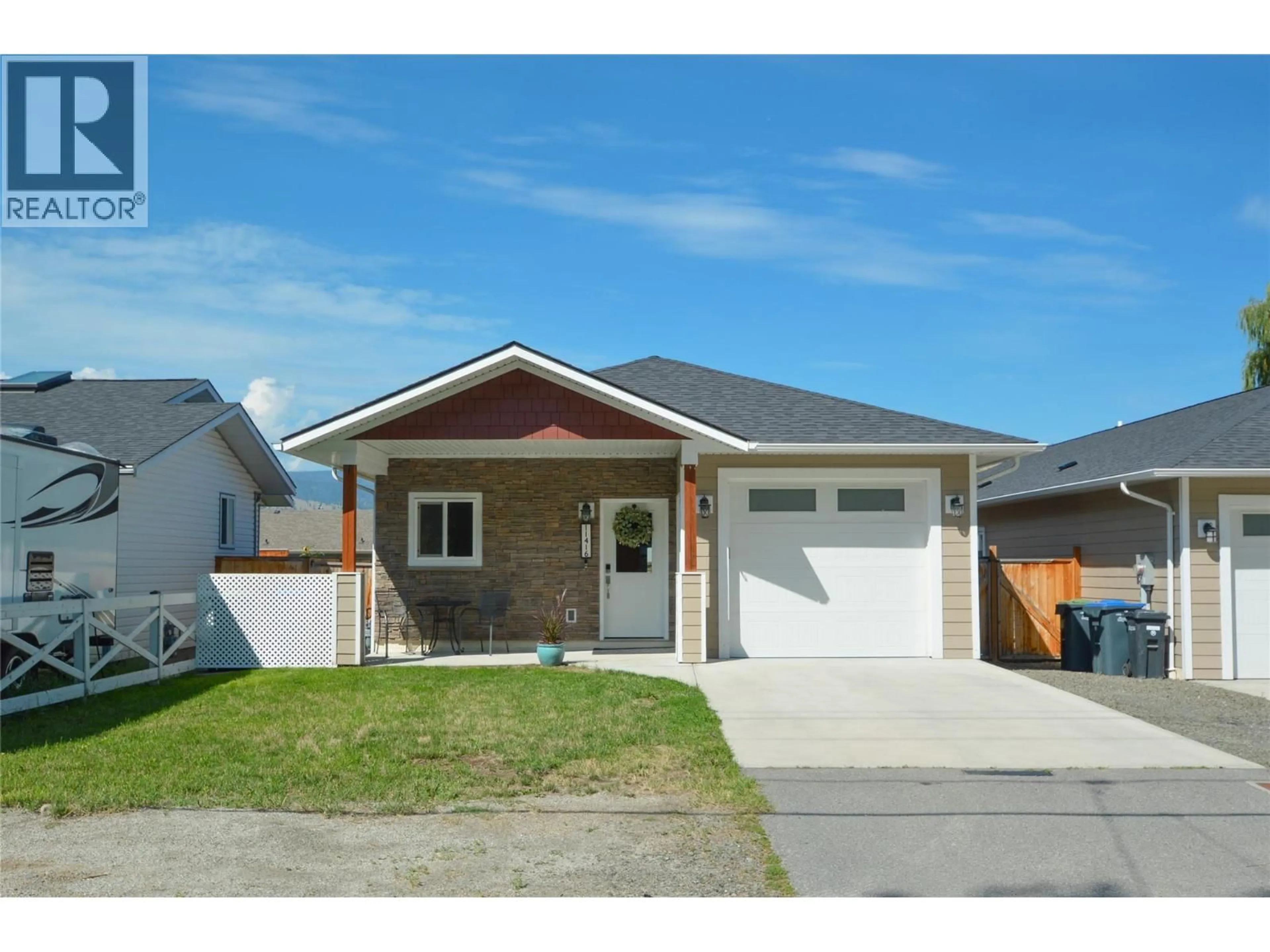 Home with vinyl exterior material, street for 11416 ADAMS AVENUE, Summerland British Columbia V0H1Z2