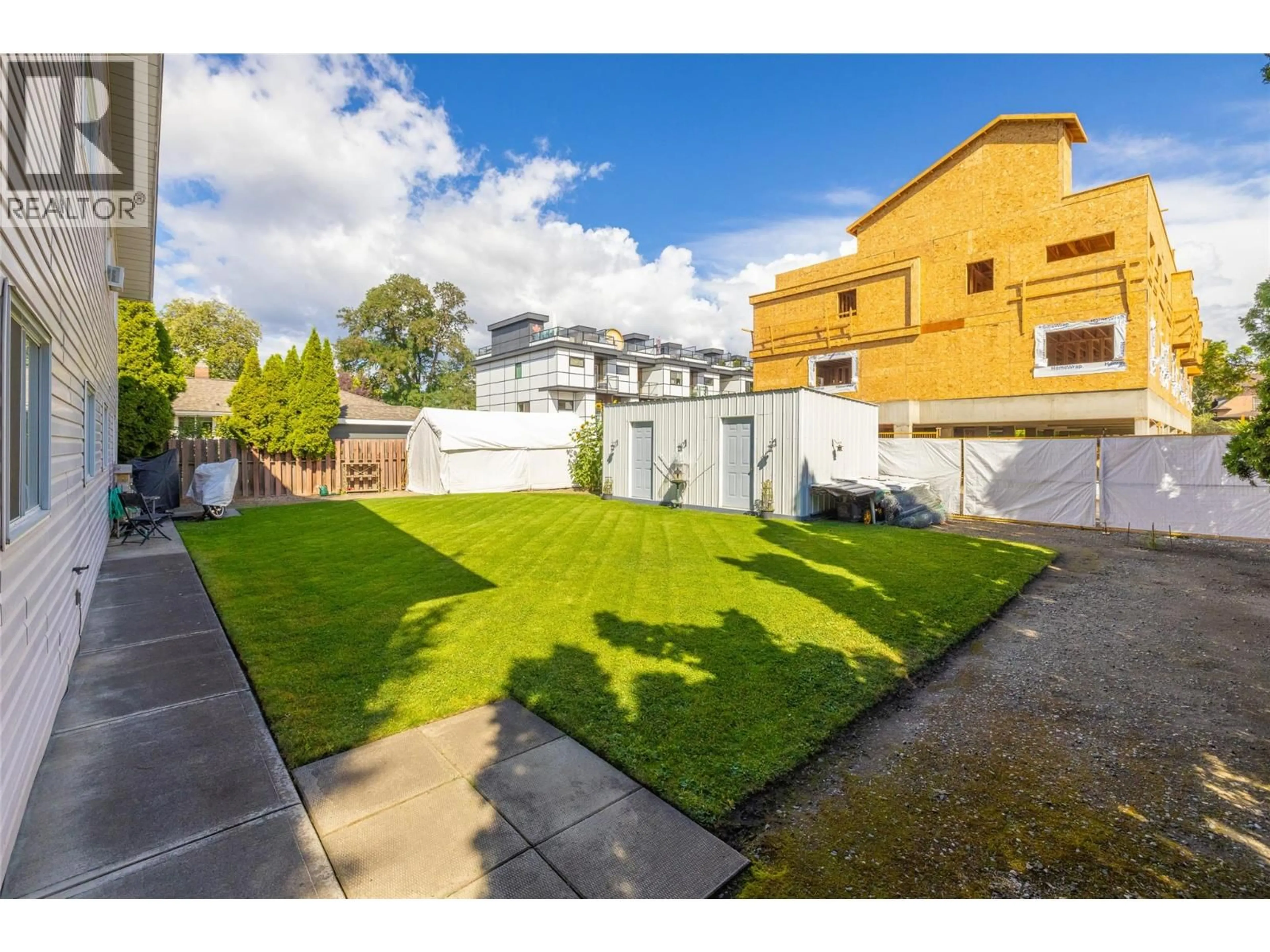 A pic from outside/outdoor area/front of a property/back of a property/a pic from drone, street for 922-926 BORDEN AVENUE, Kelowna British Columbia V1Y6A6