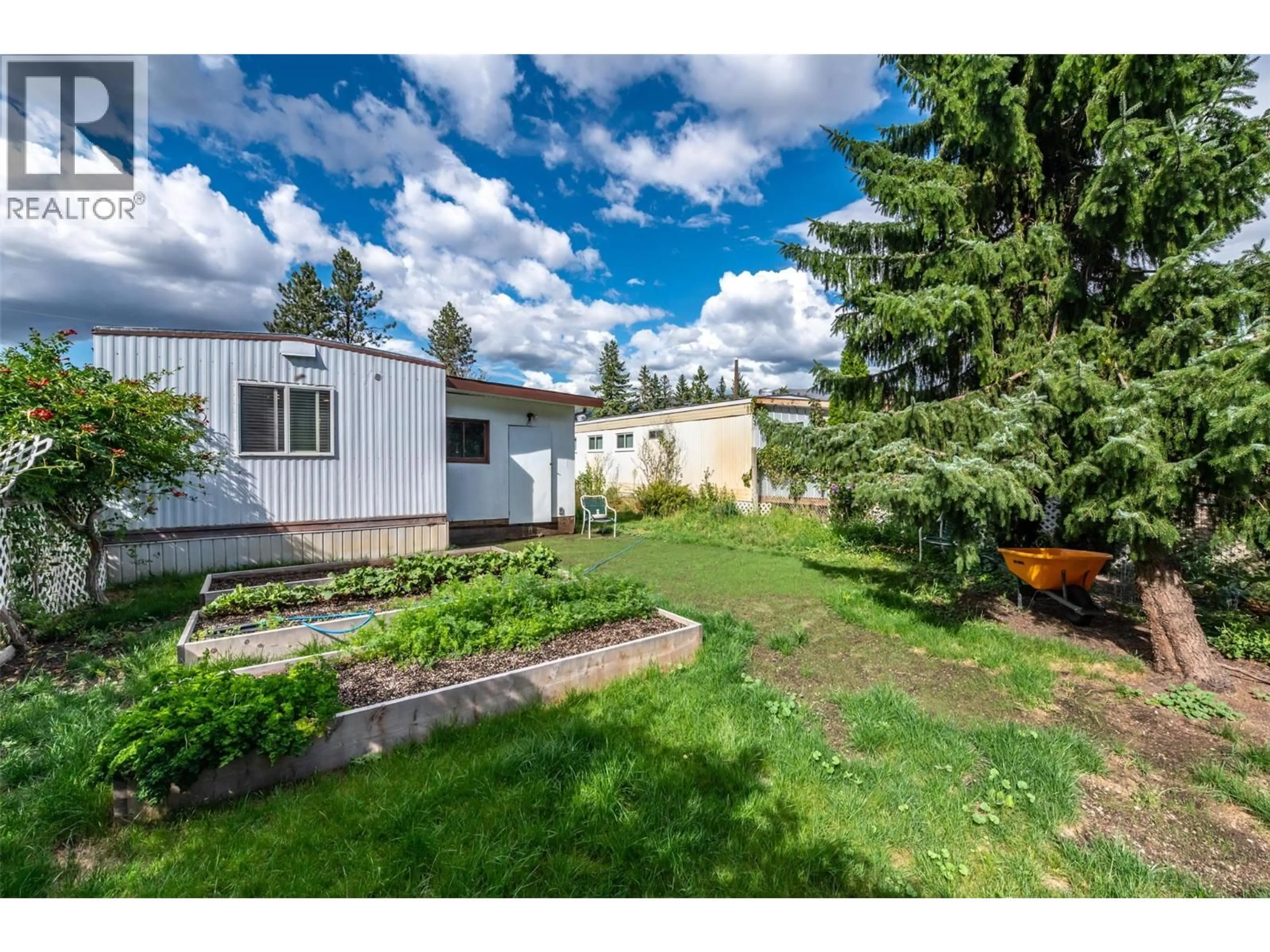 A pic from outside/outdoor area/front of a property/back of a property/a pic from drone, street for 32 - 1302 CEDAR STREET, Okanagan Falls British Columbia V0H1R0