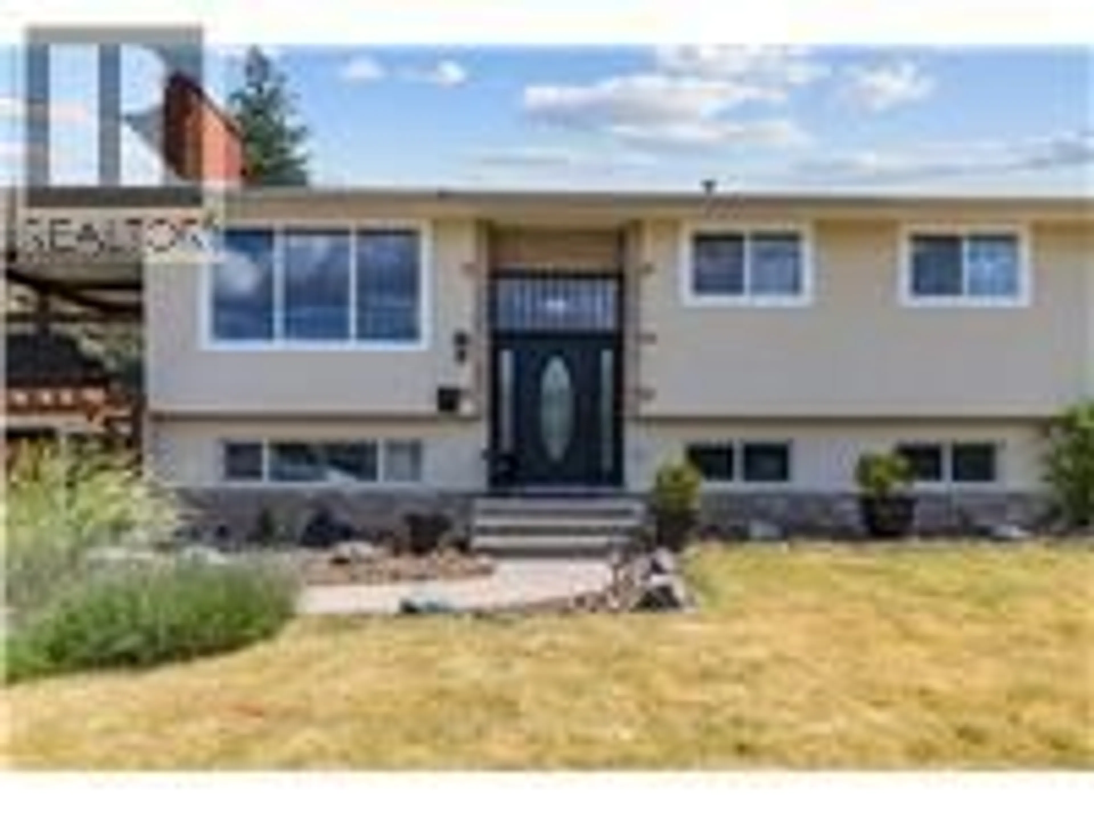 Home with vinyl exterior material, street for 4479 WASILOW ROAD, Kelowna British Columbia V1W1R7