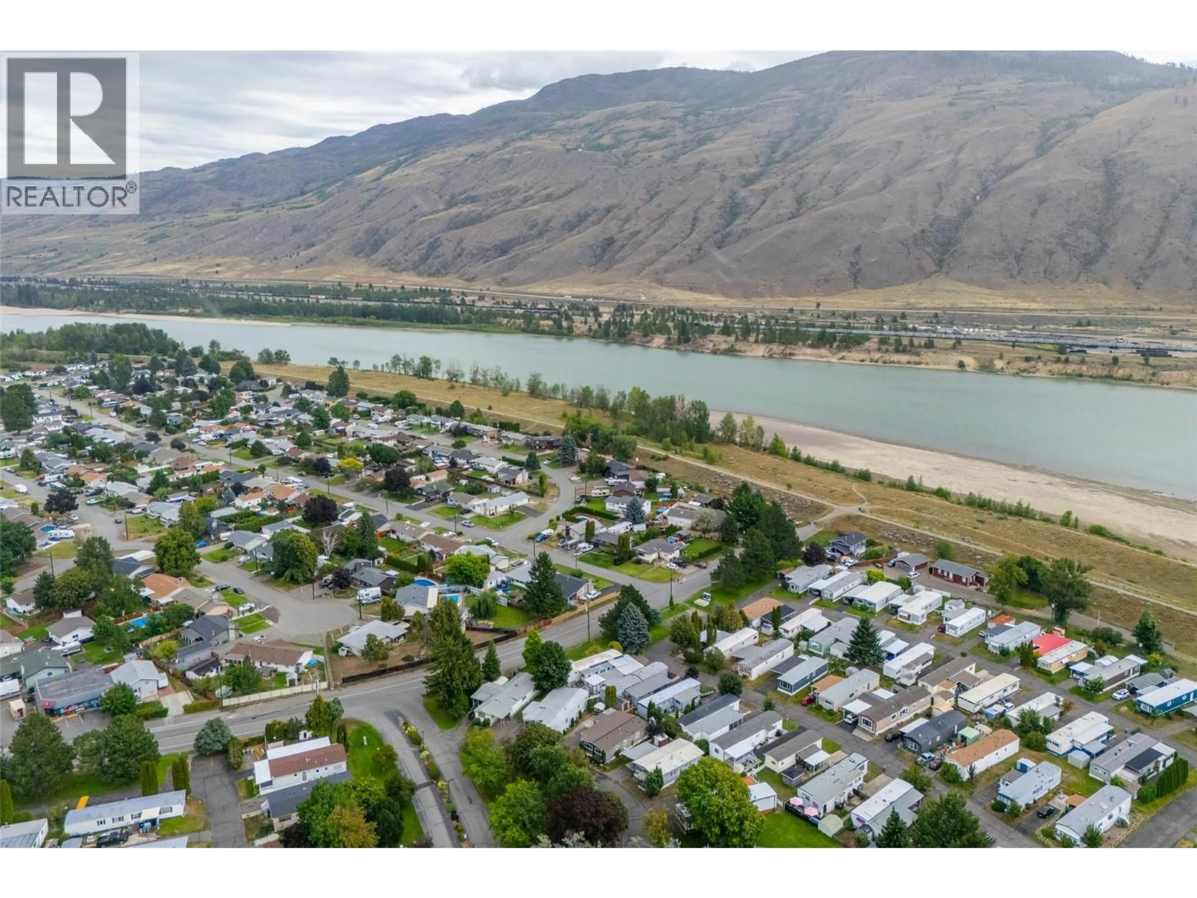 A pic from outside/outdoor area/front of a property/back of a property/a pic from drone, water/lake/river/ocean view for 236 - 2400 OAKDALE WAY, Kamloops British Columbia V2B6W7