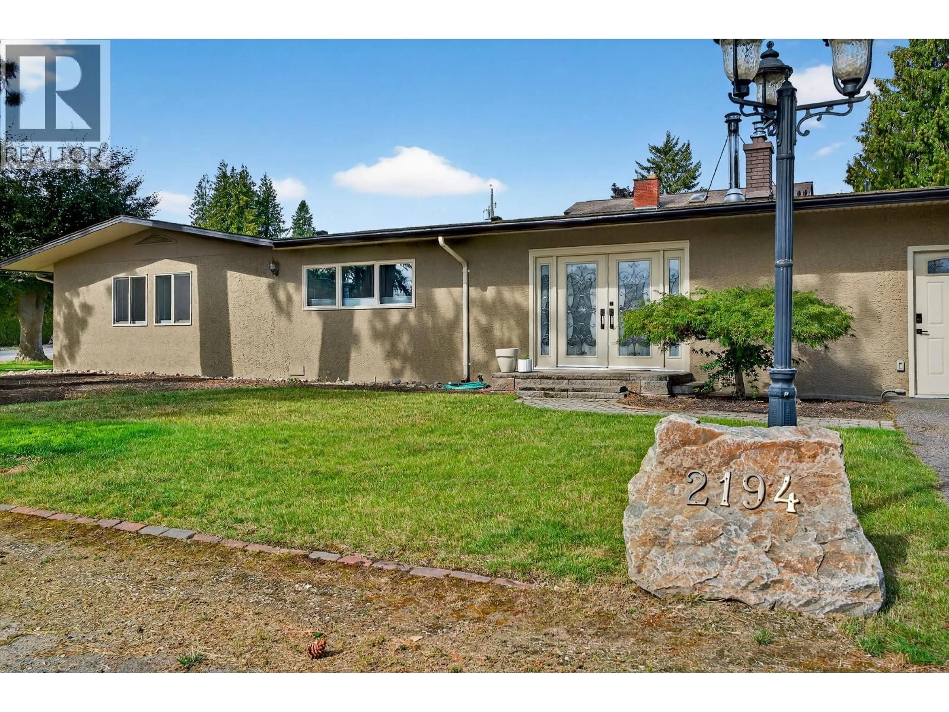 Home with vinyl exterior material, street for 2194 ESSEN ROAD, West Kelowna British Columbia V1Z1V3