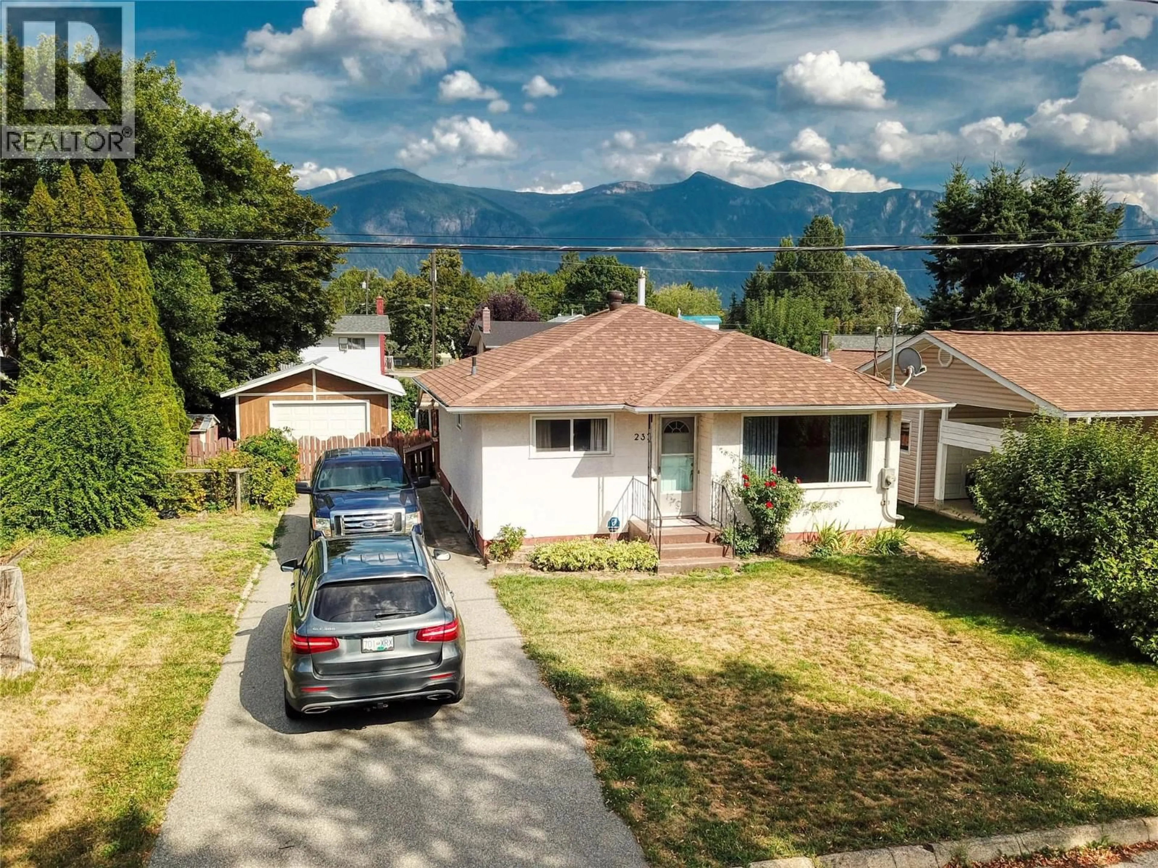 A pic from outside/outdoor area/front of a property/back of a property/a pic from drone, mountain view for 232 22ND AVENUE SOUTH, Creston British Columbia V0B1G0