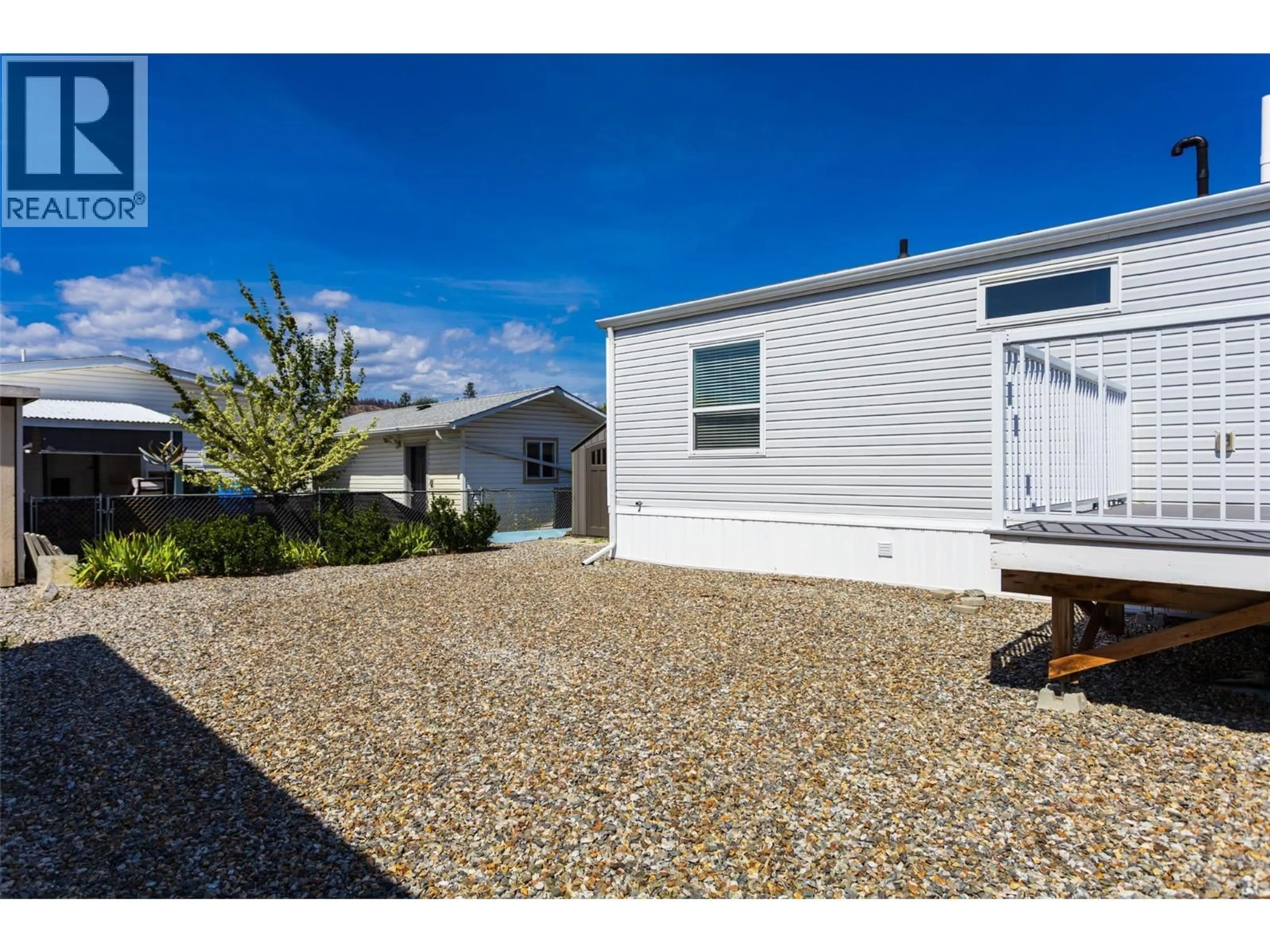Home with vinyl exterior material, street for 60 - 8945 HIGHWAY 97 N OTHER, Kelowna British Columbia V4V1E5