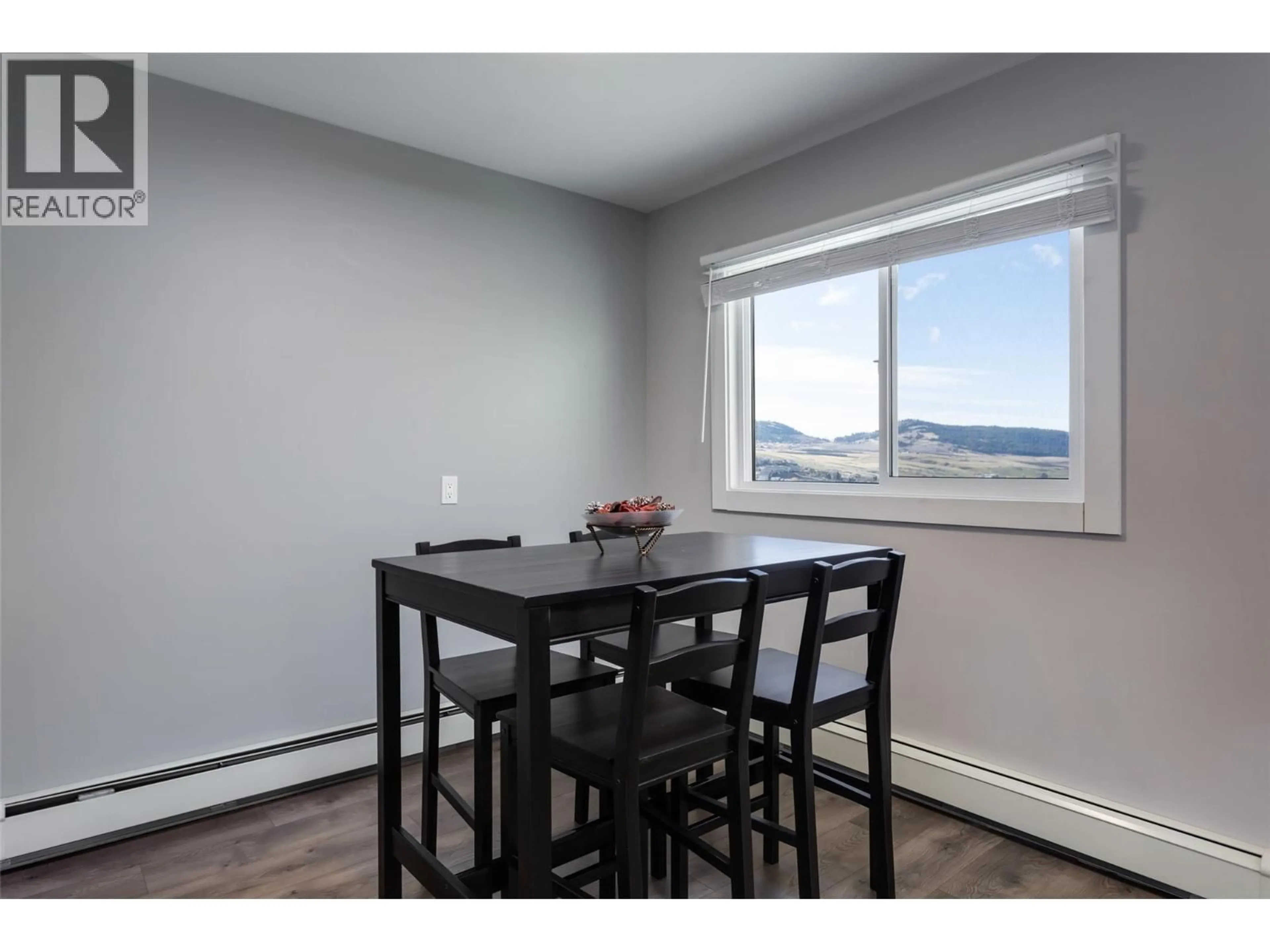 Dining room, wood/laminate floor for 514 - 3901 32 AVENUE, Vernon British Columbia V1T3M8