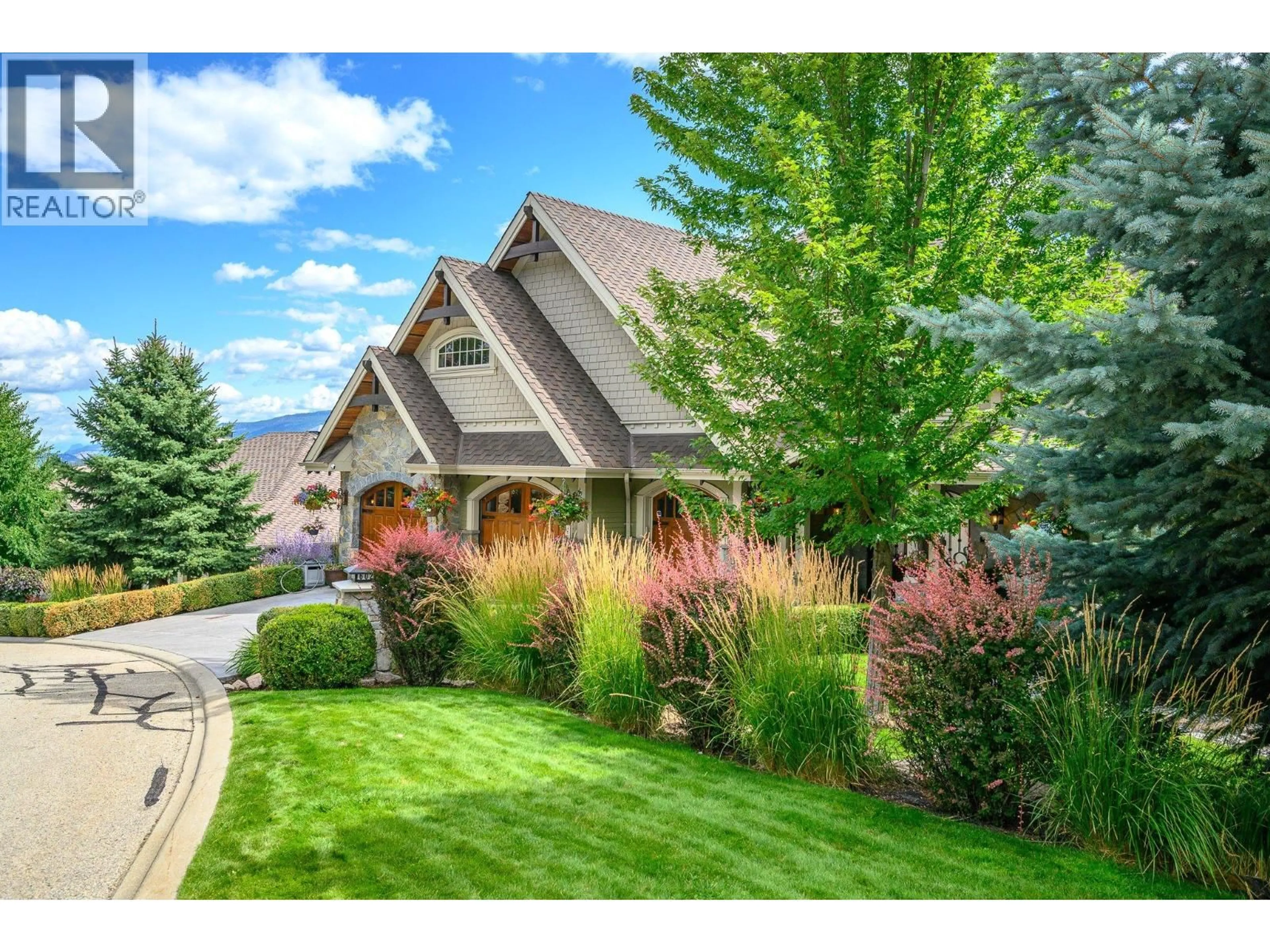 Home with vinyl exterior material, street for 602 FALCON POINT WAY, Vernon British Columbia V1H2H7