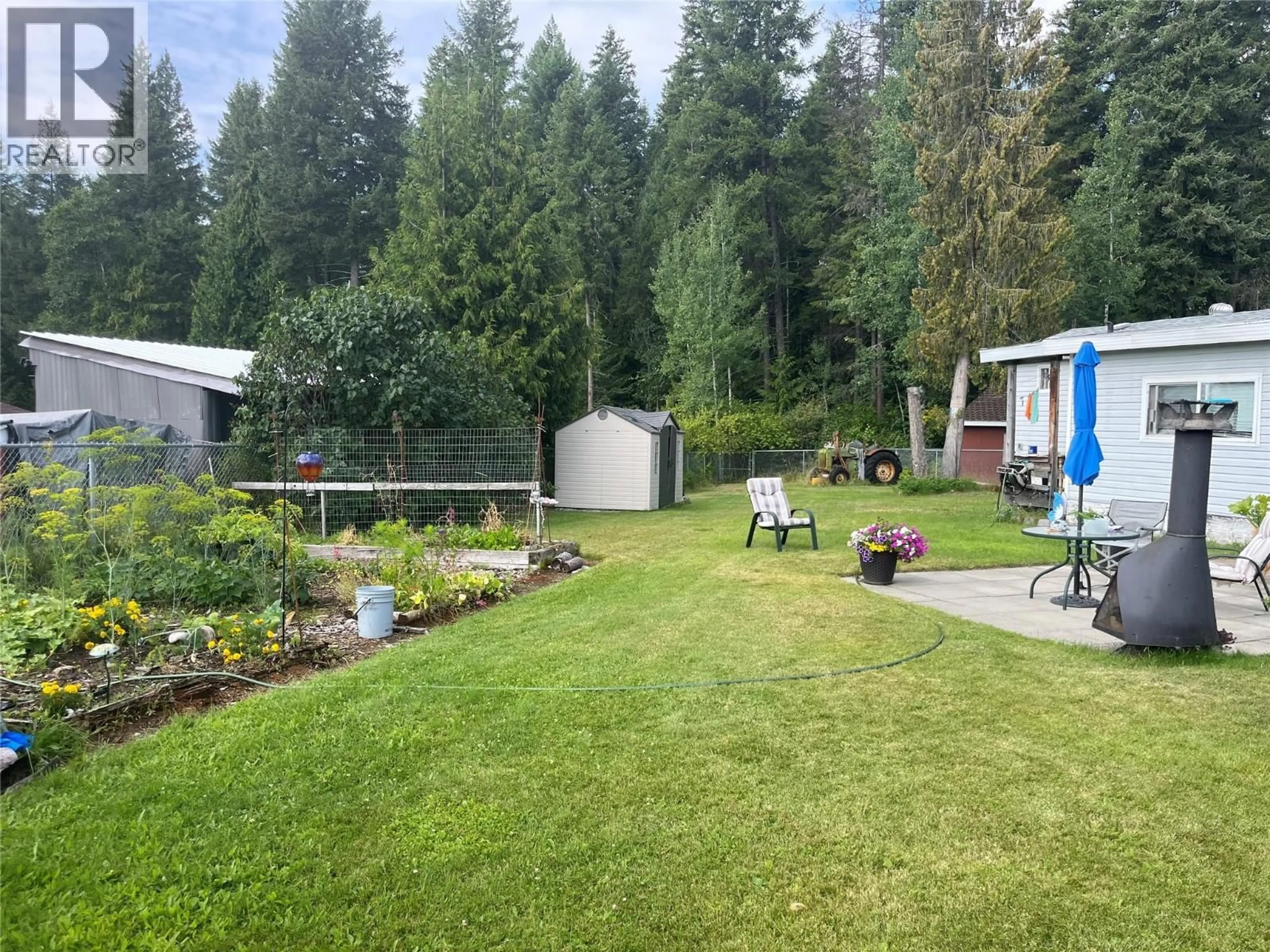 A pic from outside/outdoor area/front of a property/back of a property/a pic from drone, forest/trees view for 94 MILEEN COURT, Clearwater British Columbia V0E1N2