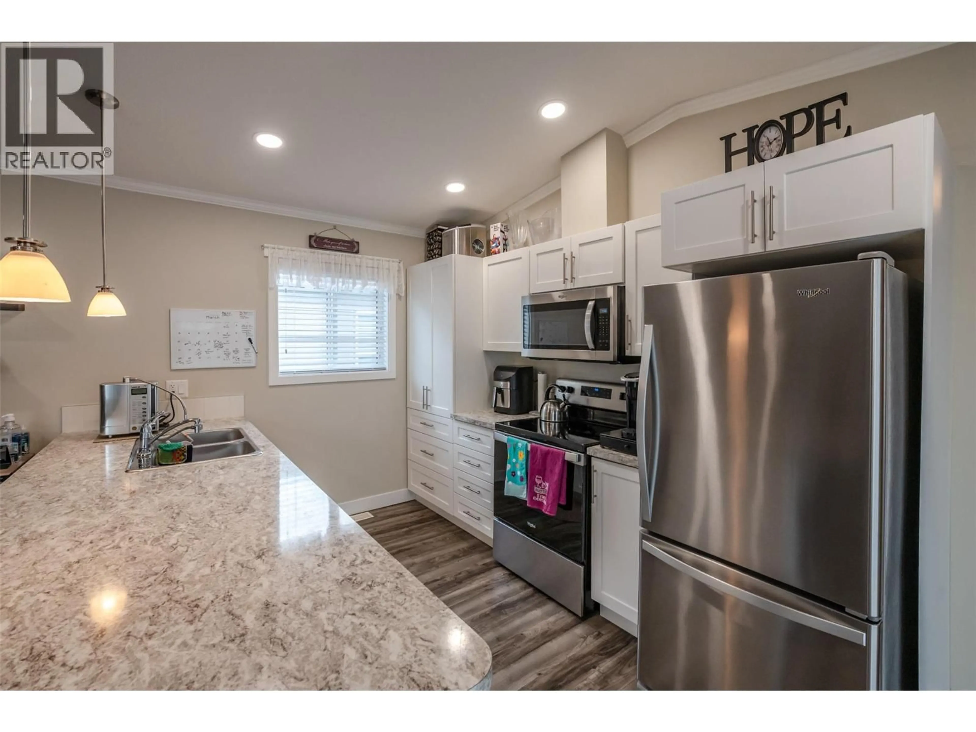 Open concept kitchen, unknown for 102 - 8598 HWY 97 OTHER, Oliver British Columbia V0H1T2