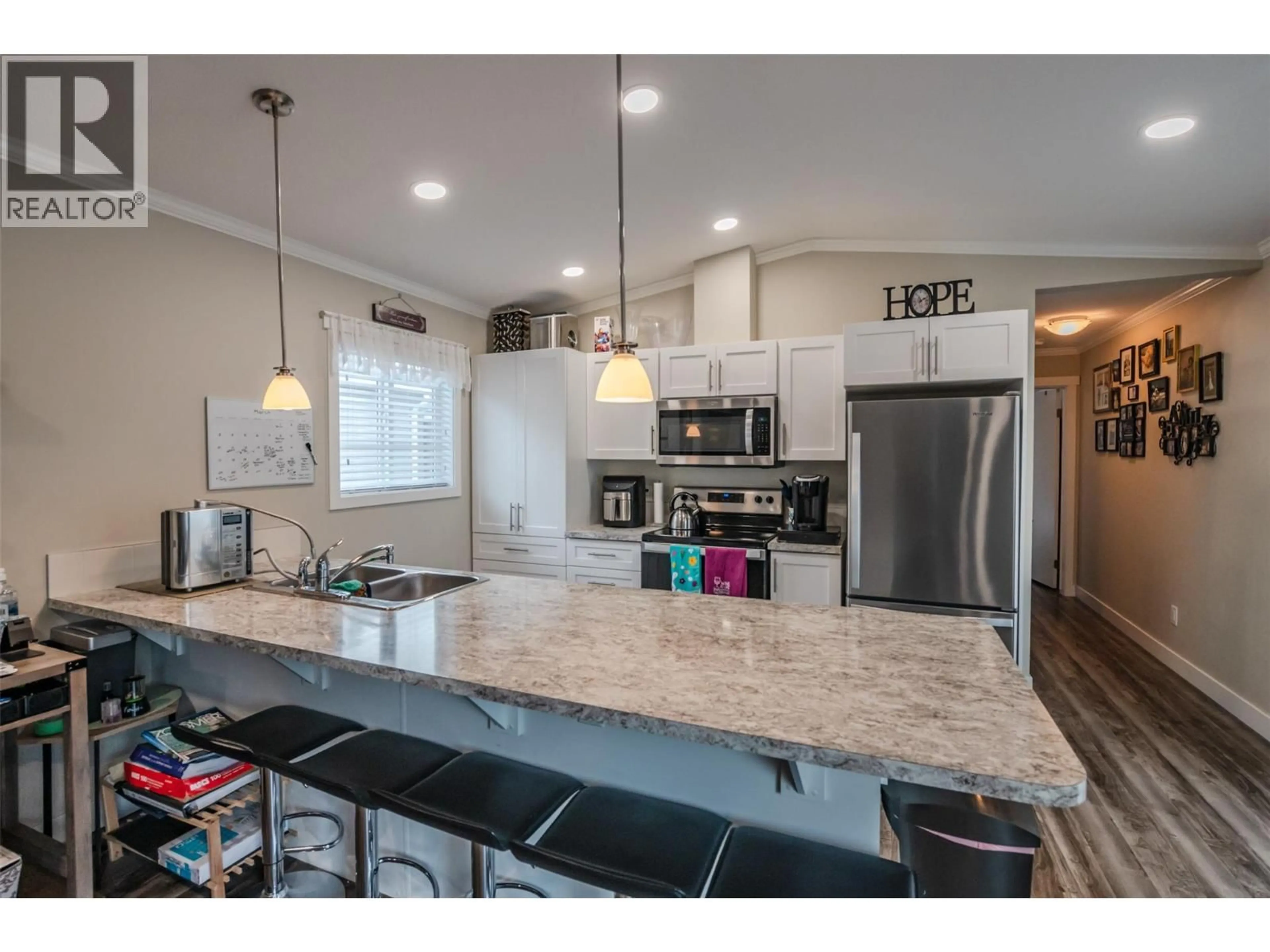 Open concept kitchen, unknown for 102 - 8598 HWY 97 OTHER, Oliver British Columbia V0H1T2