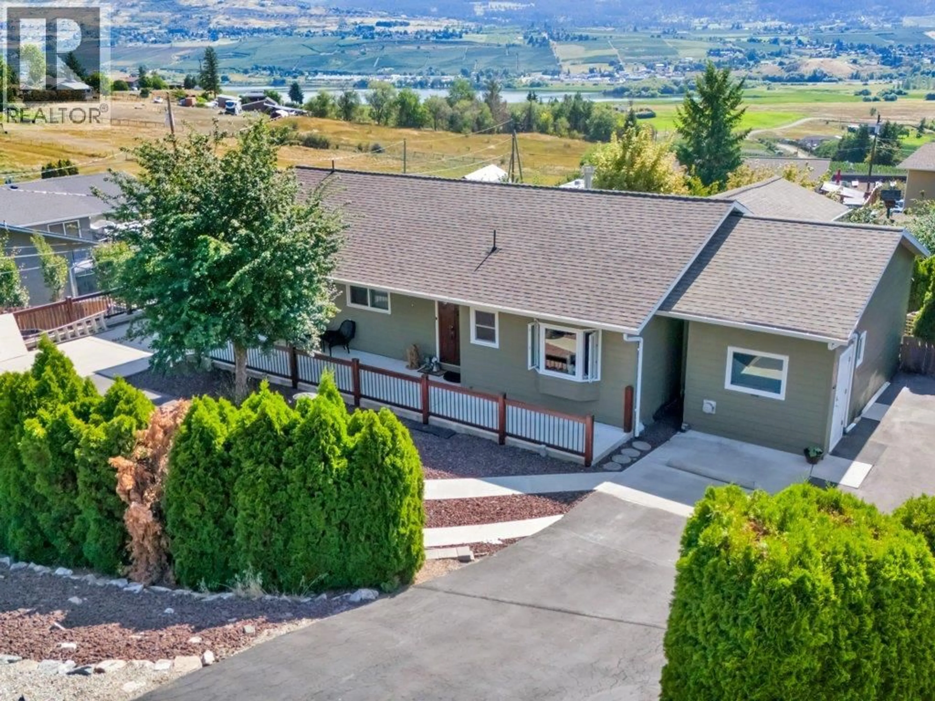 A pic from outside/outdoor area/front of a property/back of a property/a pic from drone, mountain view for 6475 BLUE JAY ROAD, Vernon British Columbia V1H1W5