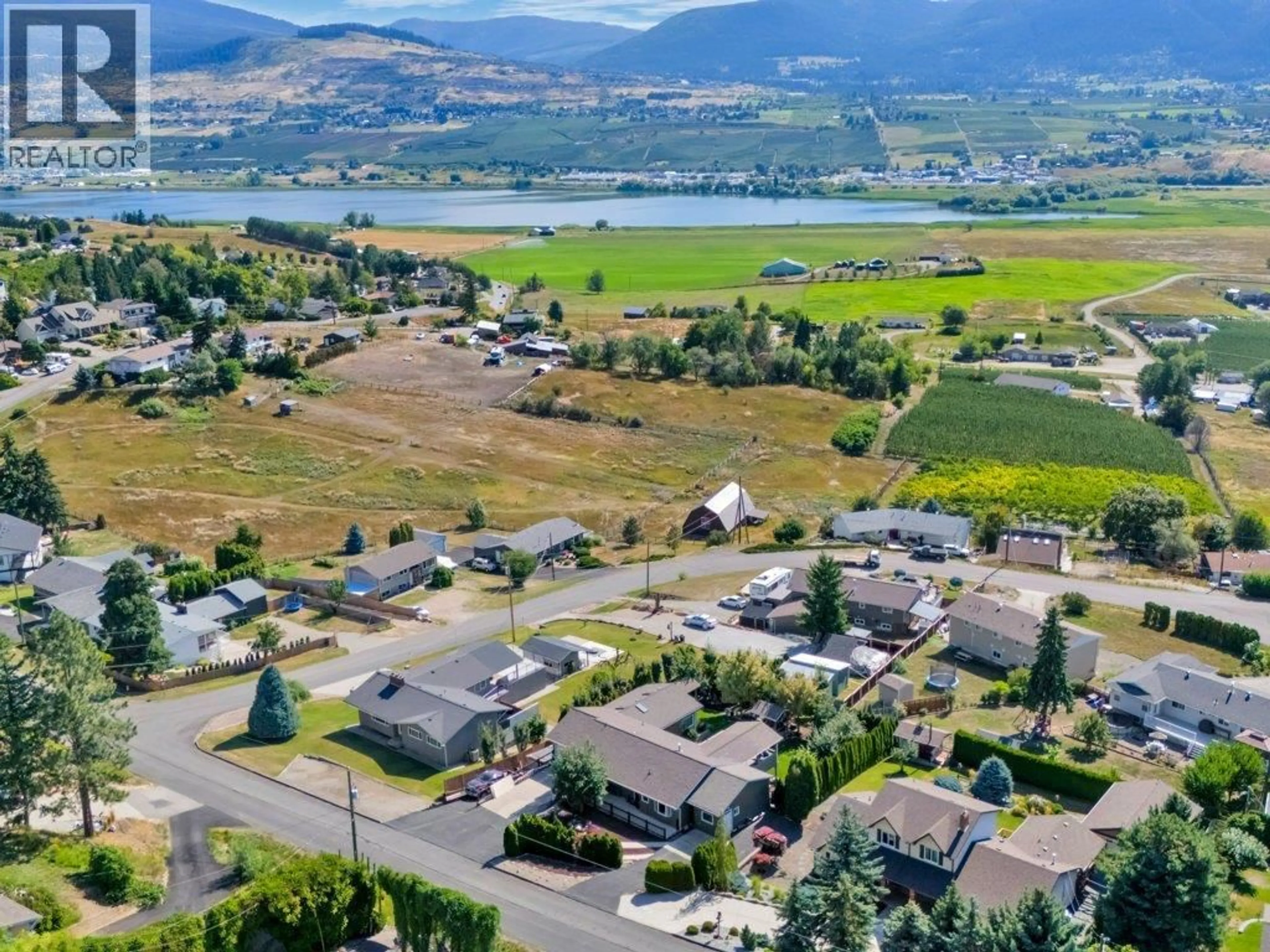A pic from outside/outdoor area/front of a property/back of a property/a pic from drone, mountain view for 6475 BLUE JAY ROAD, Vernon British Columbia V1H1W5