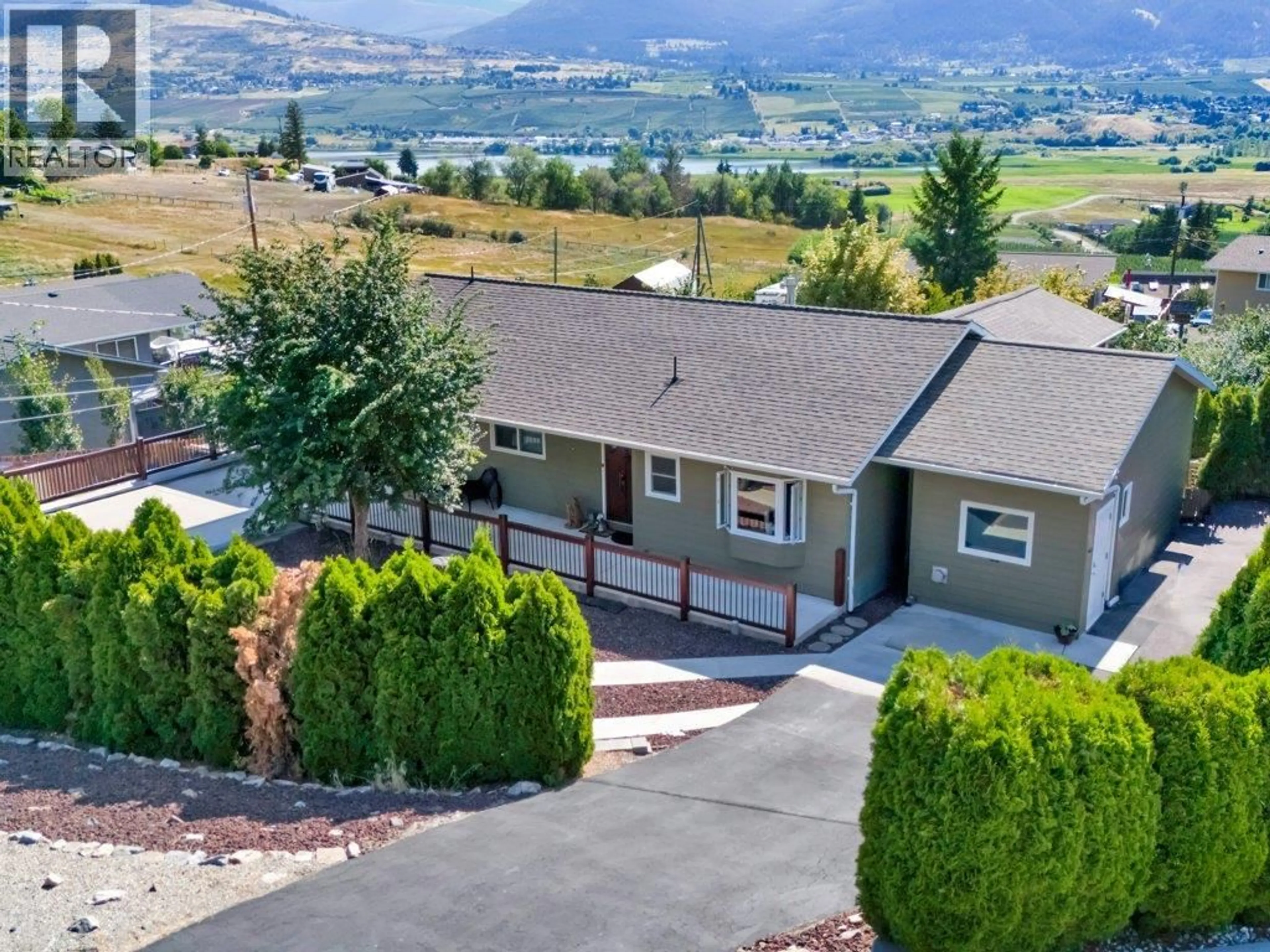 A pic from outside/outdoor area/front of a property/back of a property/a pic from drone, mountain view for 6475 BLUE JAY ROAD, Vernon British Columbia V1H1W5