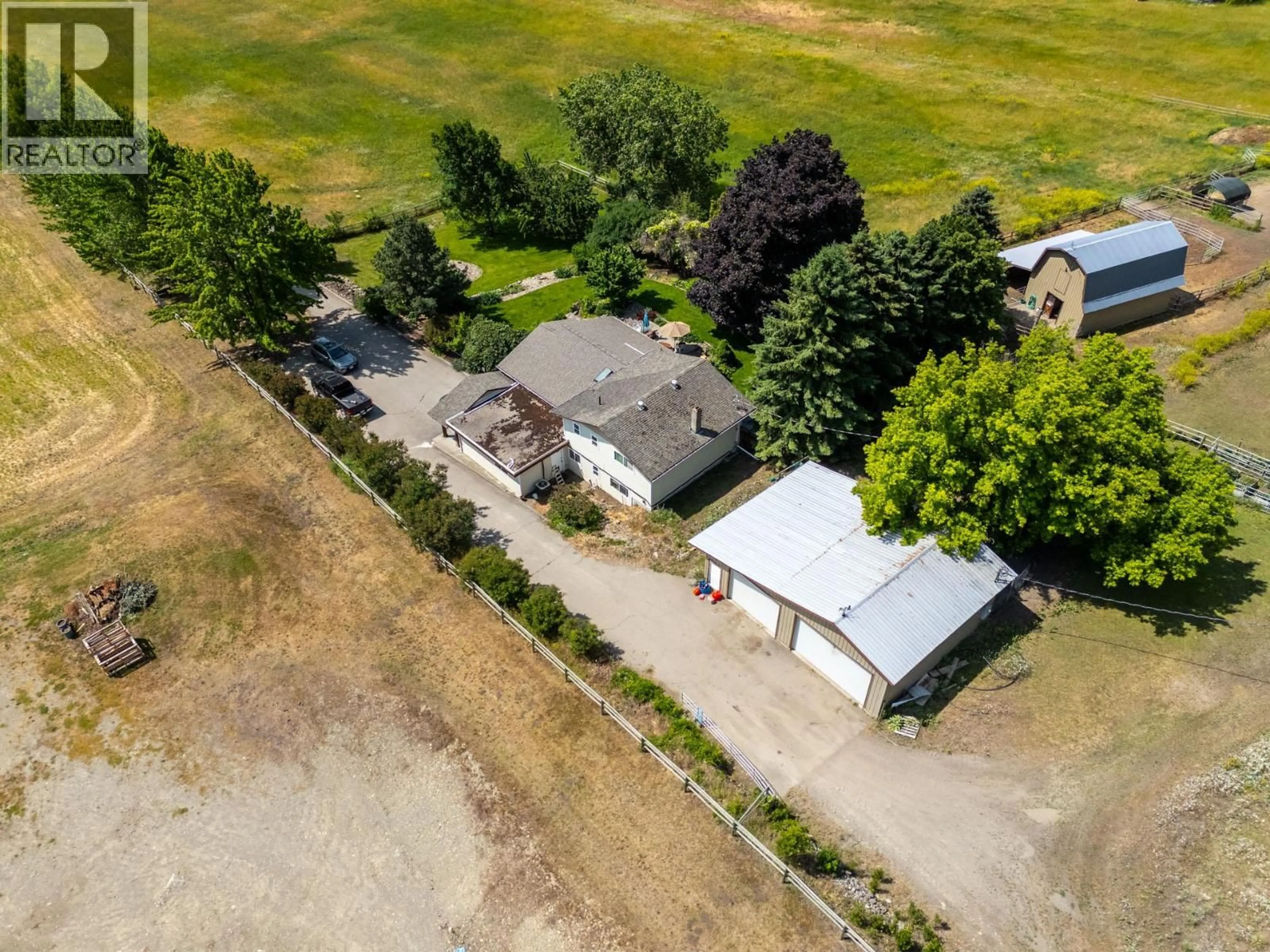 A pic from outside/outdoor area/front of a property/back of a property/a pic from drone, street for 6651 BUCHANAN ROAD, Coldstream British Columbia V1B3C6