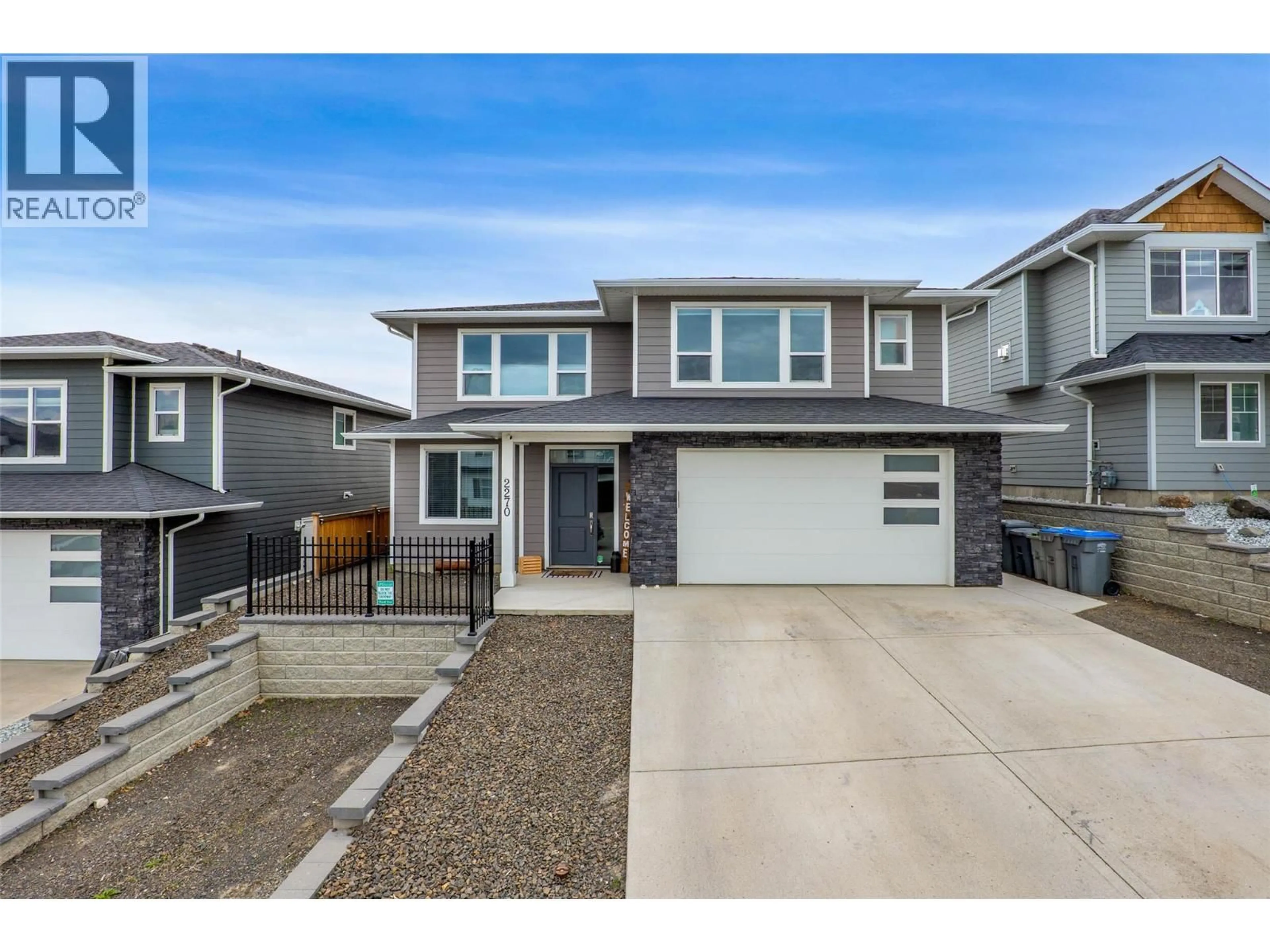 Home with vinyl exterior material, street for 2270 SADDLEBACK DRIVE, Kamloops British Columbia V2B0G7