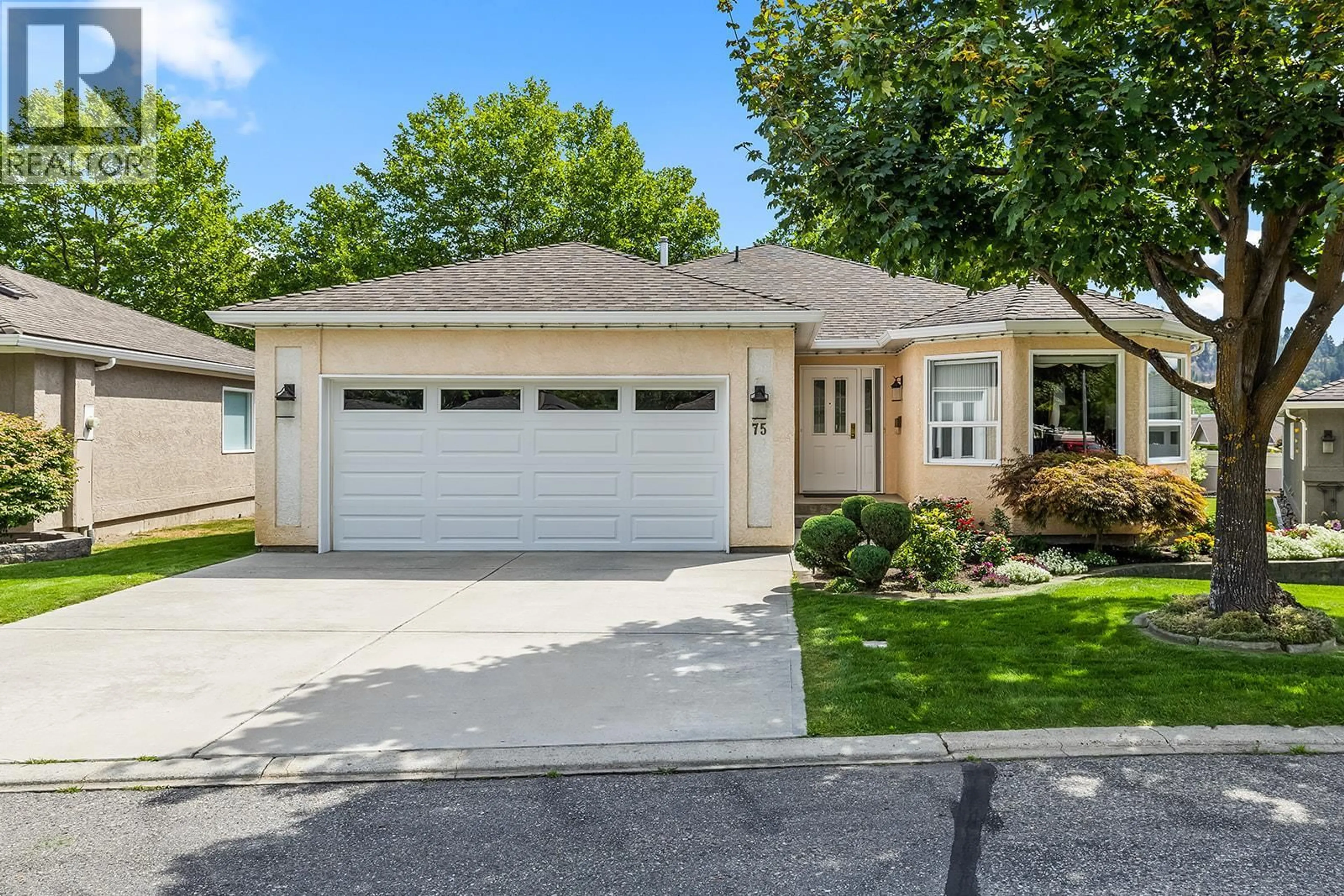 Home with vinyl exterior material, street for 75 - 615 GLENMEADOWS ROAD, Kelowna British Columbia V1V1N9