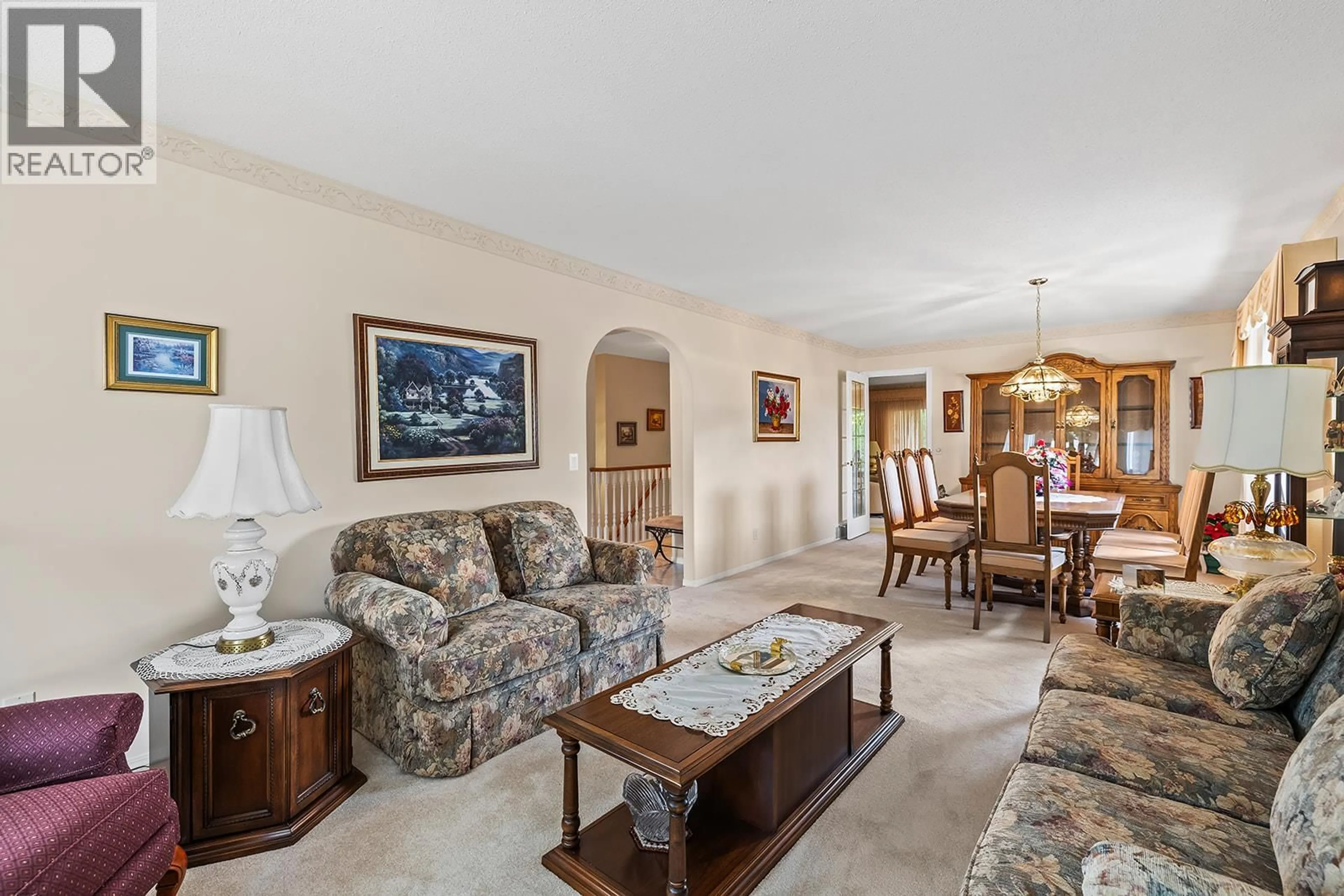 Living room with furniture, ceramic/tile floor for 75 - 615 GLENMEADOWS ROAD, Kelowna British Columbia V1V1N9