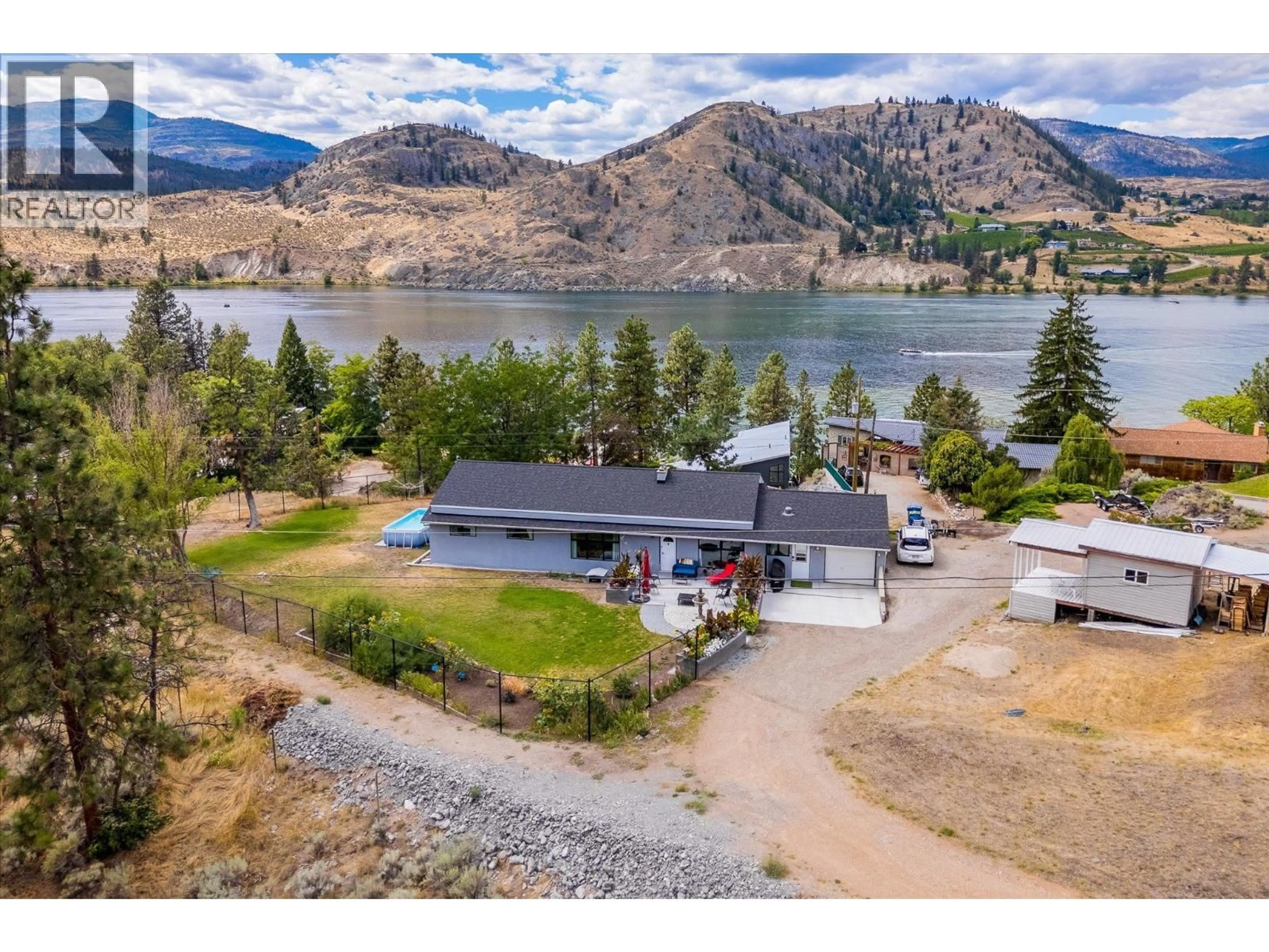 A pic from outside/outdoor area/front of a property/back of a property/a pic from drone, water/lake/river/ocean view for 515 PHILPOTT ROAD, Okanagan Falls British Columbia V0H1R0