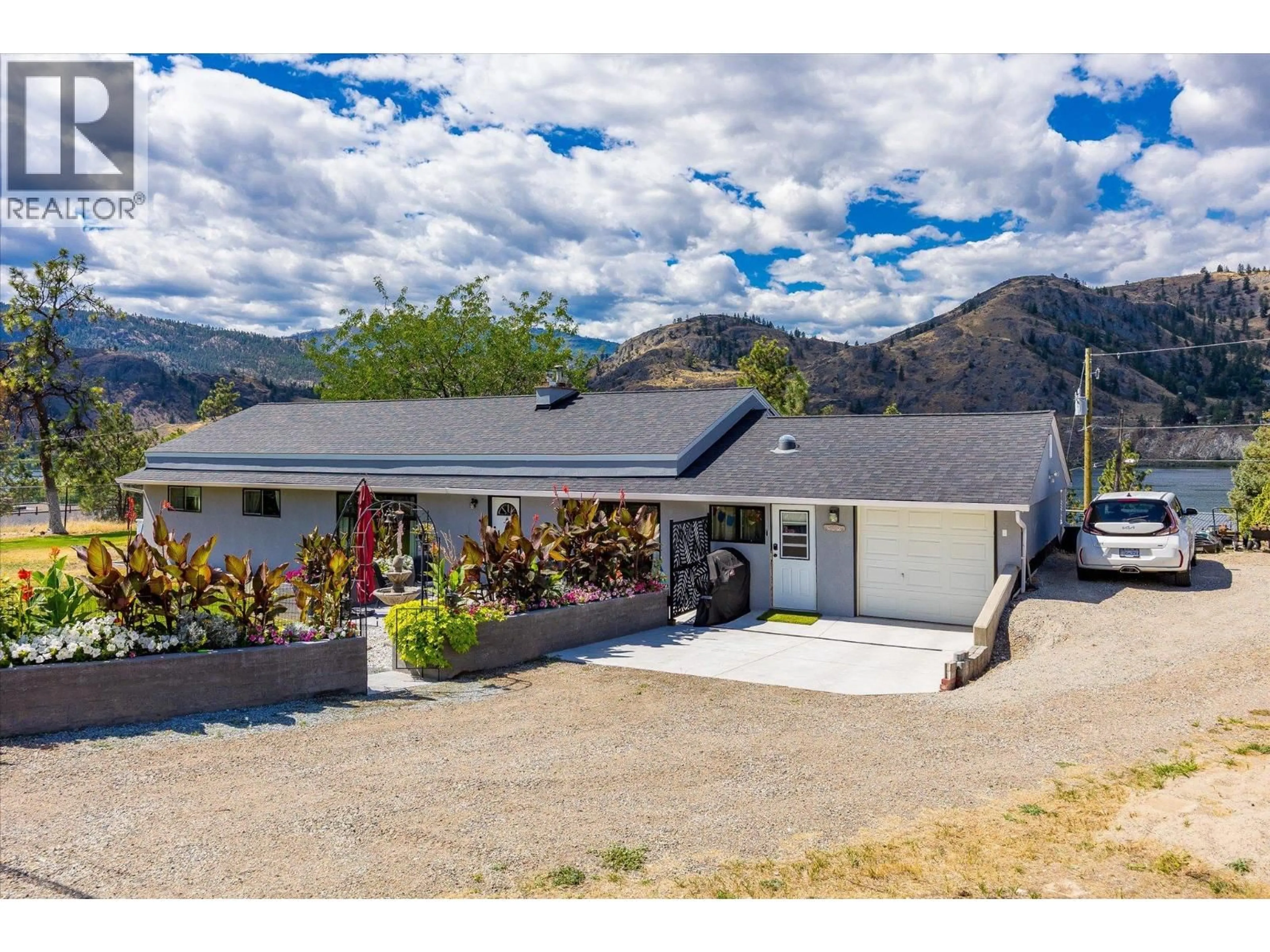 A pic from outside/outdoor area/front of a property/back of a property/a pic from drone, mountain view for 515 PHILPOTT ROAD, Okanagan Falls British Columbia V0H1R0