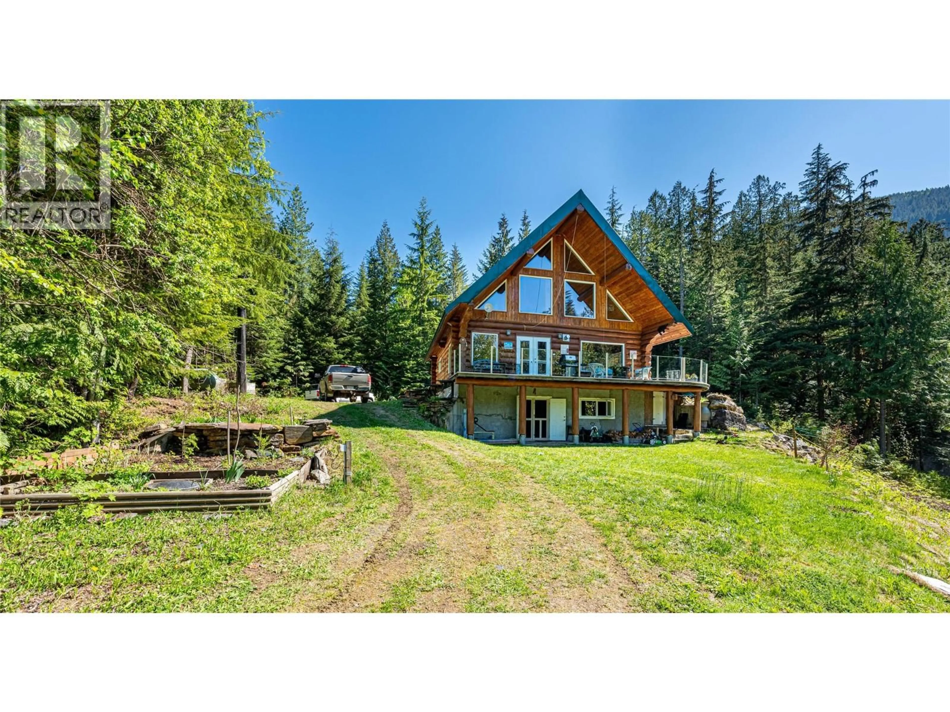 A pic from outside/outdoor area/front of a property/back of a property/a pic from drone, water/lake/river/ocean view for 327 SALMON CREEK ROAD, Beaton British Columbia V0G1R2